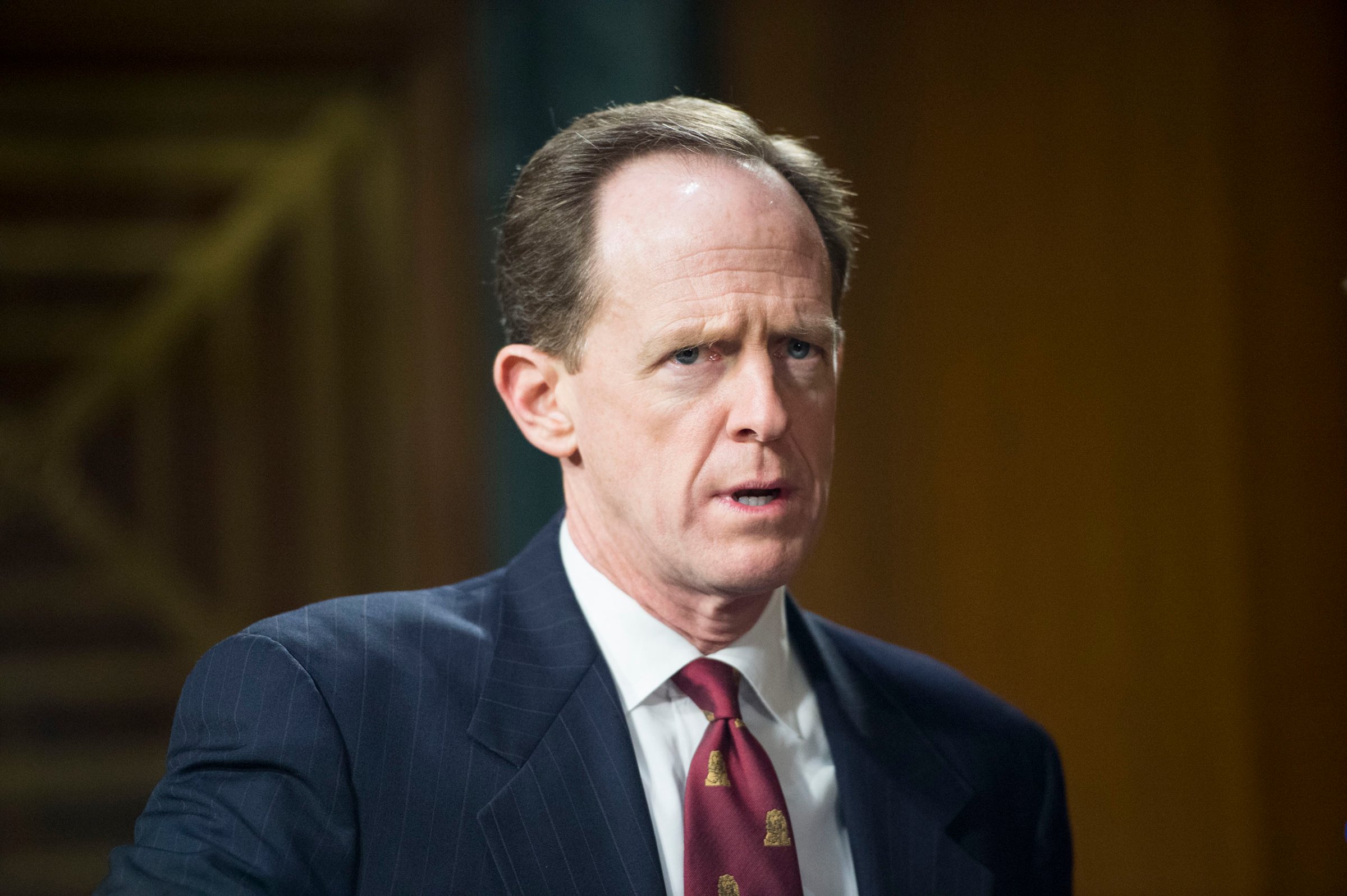 Pat Toomey arrives for the Senate Banking, Housing and Urban Affairs Committee hearing on "The Semiannual Monetary Policy Report to the Congress" on Feb. 24, 2015.