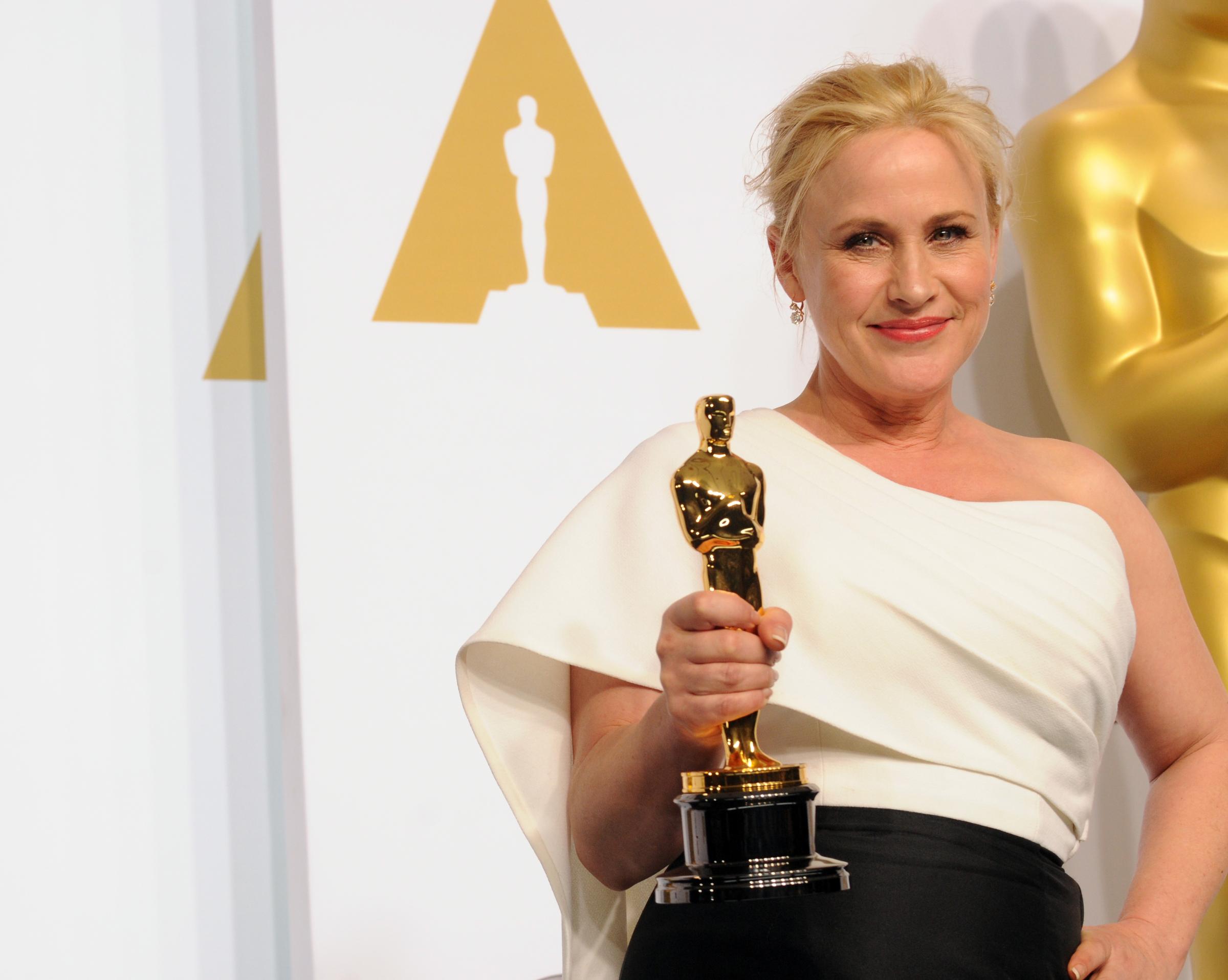 Actress Patricia Arquette winner for Best Supporting Actress in "Boyhood" poses inside the press room of the 87th Annual Academy Awards held at Loews Hollywood Hotel on February 22, 2015 in Hollywood, California.