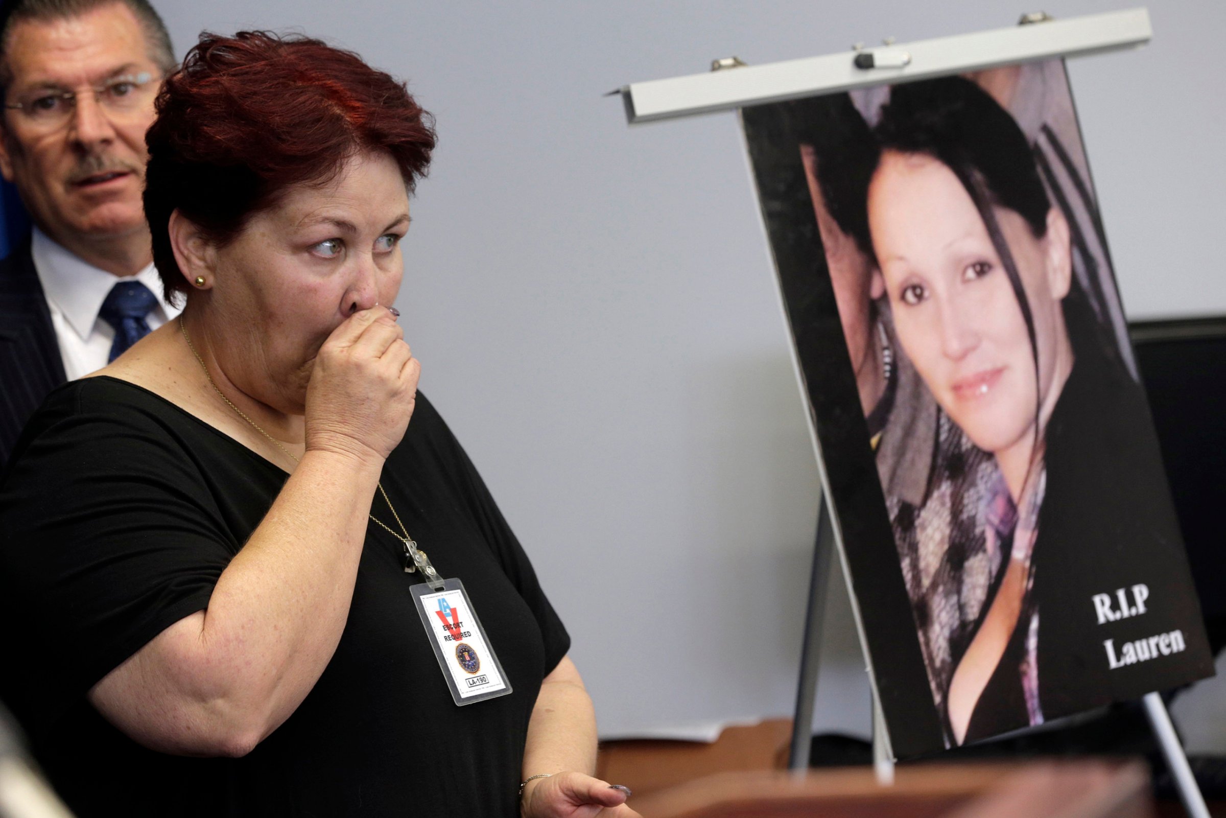 Jerilyn Olguin, mother of murder victim Lauren Elaine Olguin, seen in the photo, appears at a FBI news conference announcing additions to its 10 Most Wanted list, in Los Angeles, May 19, 2016.