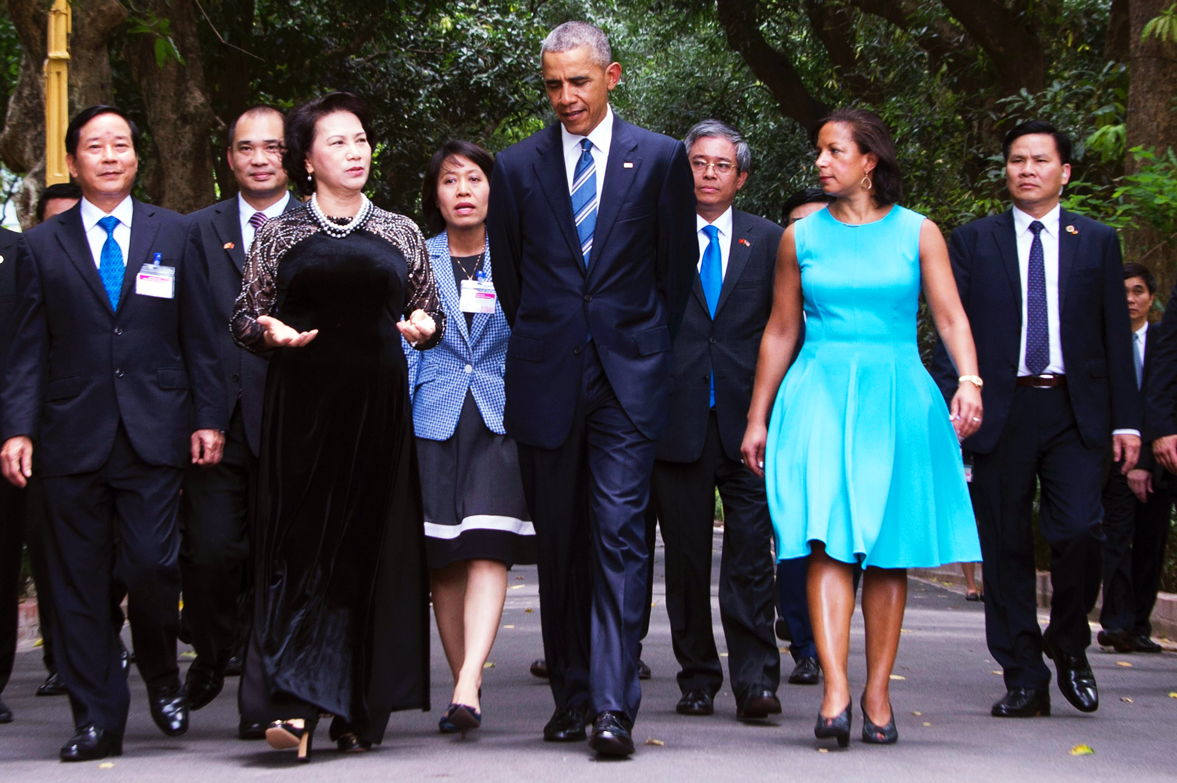 President Barack Obama walks with Vietnam's National Assembly Chairwoman Nguyen Thi Kim Ngan during his visit to the Presidential Palace in Hanoi on May 23.