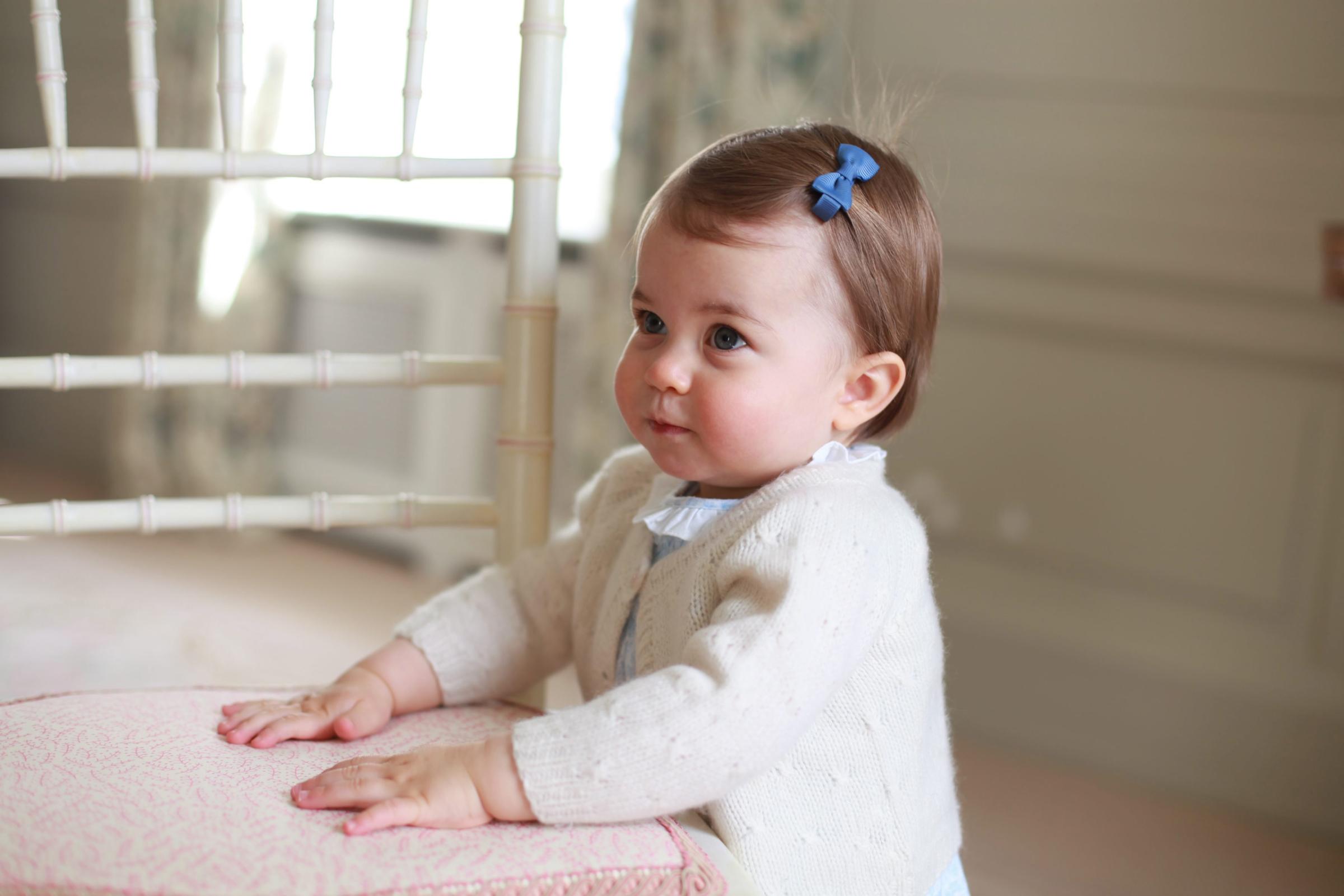 epa05285464 An April 2016 handout picture released by the Duke and Duchess of Cambridge and made available by Kensington Palace on 01 May 2016 shows Princess Charlotte taken by the Duchess at Anmer Hall in Norfolk. Princess Charlotte will celebrate her first birthday on 02 May 2016. NOTE TO EDITORS: This handout photo may only be used in for editorial reporting purposes for the contemporaneous illustration of events, things or the people in the image or facts mentioned in the caption. Reuse of the picture may require further permission from the copyright holder. Copyright: HRH The Duchess of Cambridge 2016. NEWS EDITORIAL USE ONLY. NO COMMERCIAL USE (including any use in merchandising, advertising or any other non-editorial use including, for example, calendars, books and supplements). This photograph is provided to you strictly on condition that you will make no charge for the supply, release or publication of it and that these conditions and restrictions will apply (and that you will pass these on) to any organisation to whom you supply it. All other requests for use should be directed to the Press Office at Kensington Palace in writing. EPA/HRH THE DUCHESS OF CAMBRIDGE/HANDOUT UK AND IRELAND OUT HANDOUT EDITORIAL USE ONLY/NO SALES