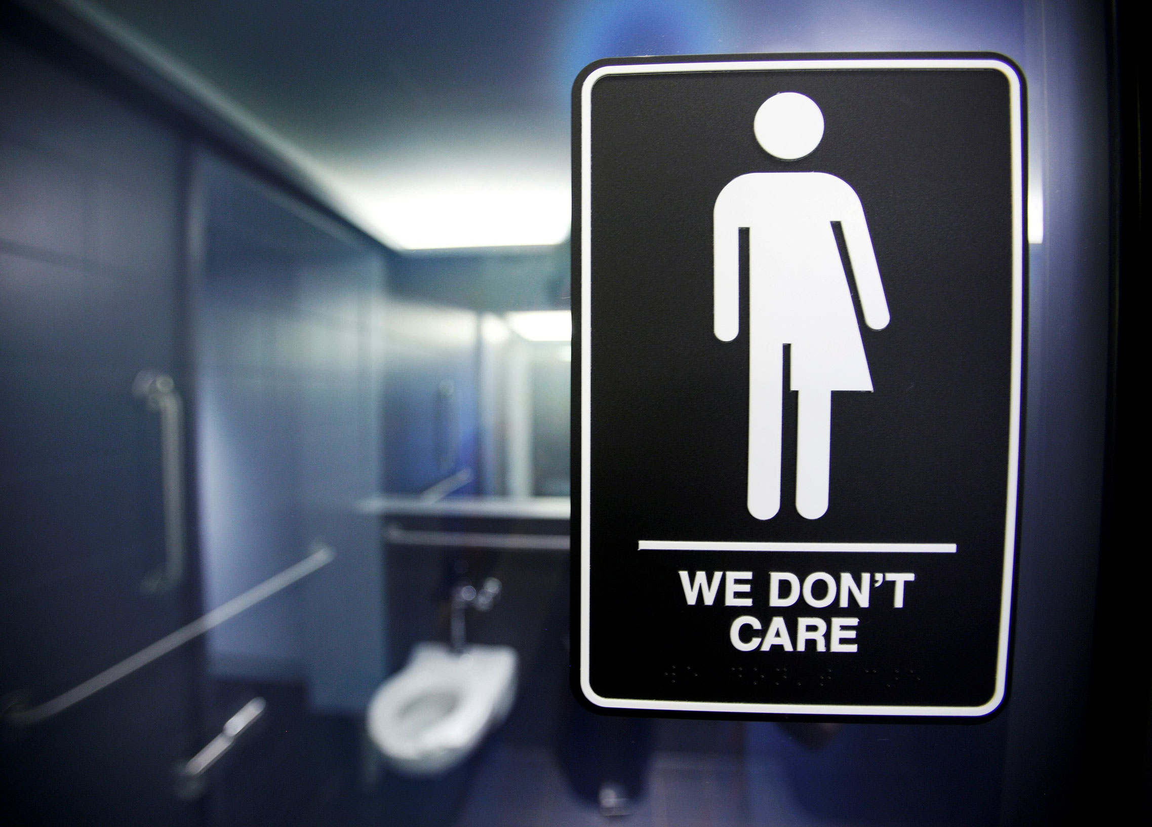A sign protesting a recent North Carolina law restricting transgender bathroom access in Durham, North Carolina