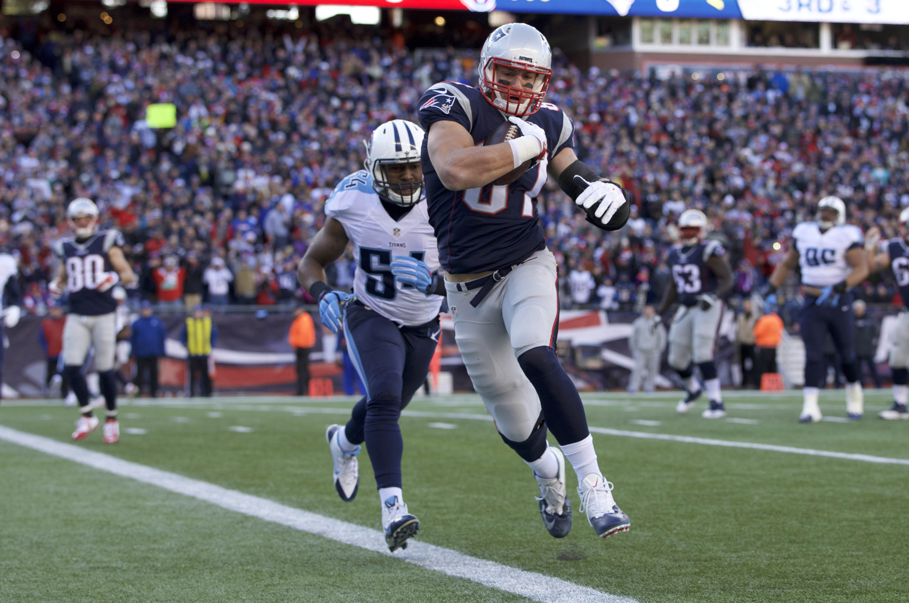 New England Patriots tight end Rob Gronkowski score a touchdown against the Tennessee Titans at Gillette Stadium in Foxborough, Mass., on Dec. 20, 2015 (David Butler—USA Today Sports/Reuters)