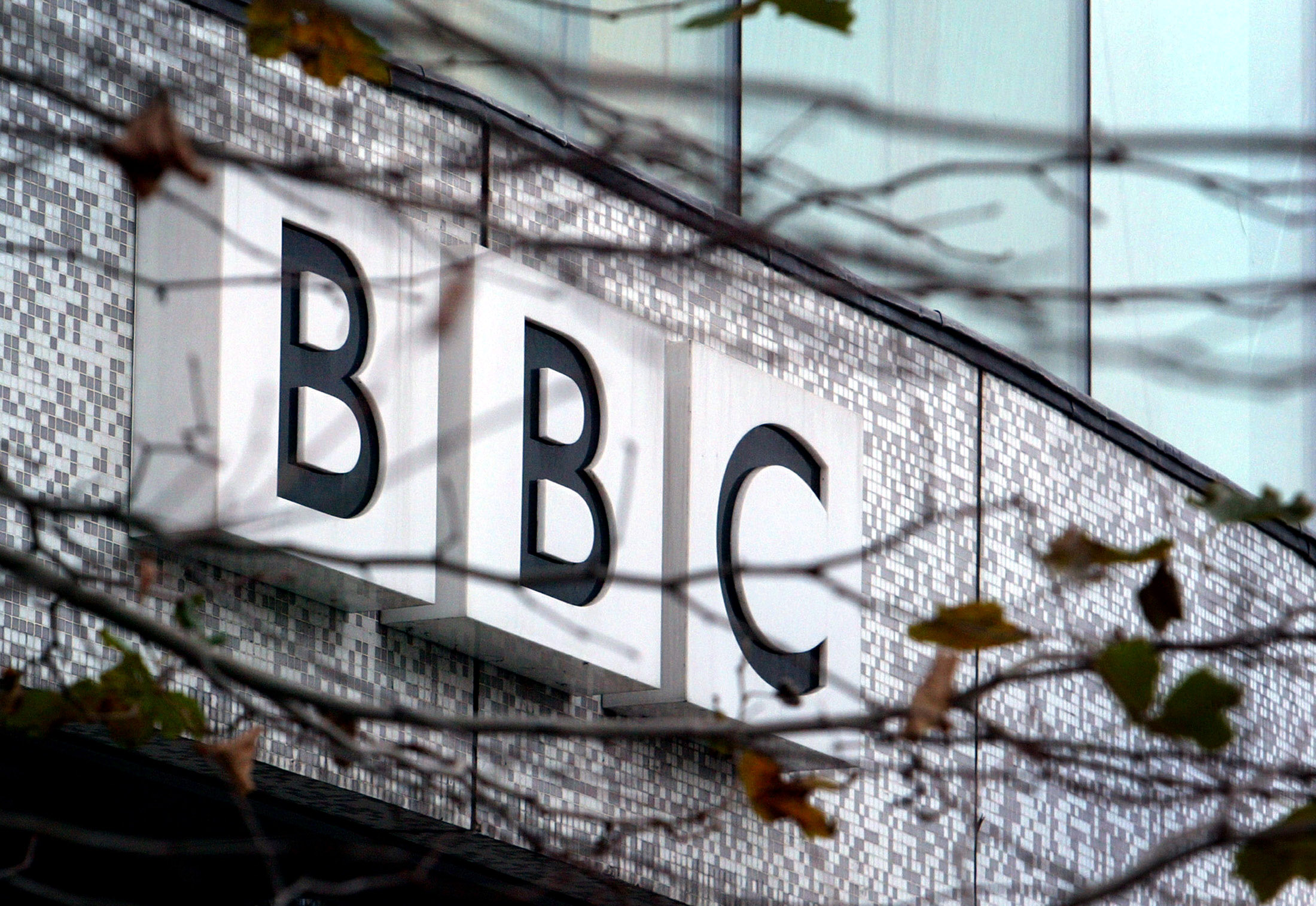 A BBC logo is seen at the company's main offices, in west London, on the day the organisation announ..