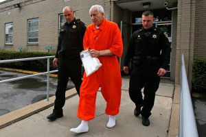 Former Penn State University assistant football coach Jerry Sandusky, center, leaves the Centre County Courthouse after a hearing of arguments on his request for an evidentiary hearing as he seeks a new trial in Bellefonte, Pa., May 2, 2016.