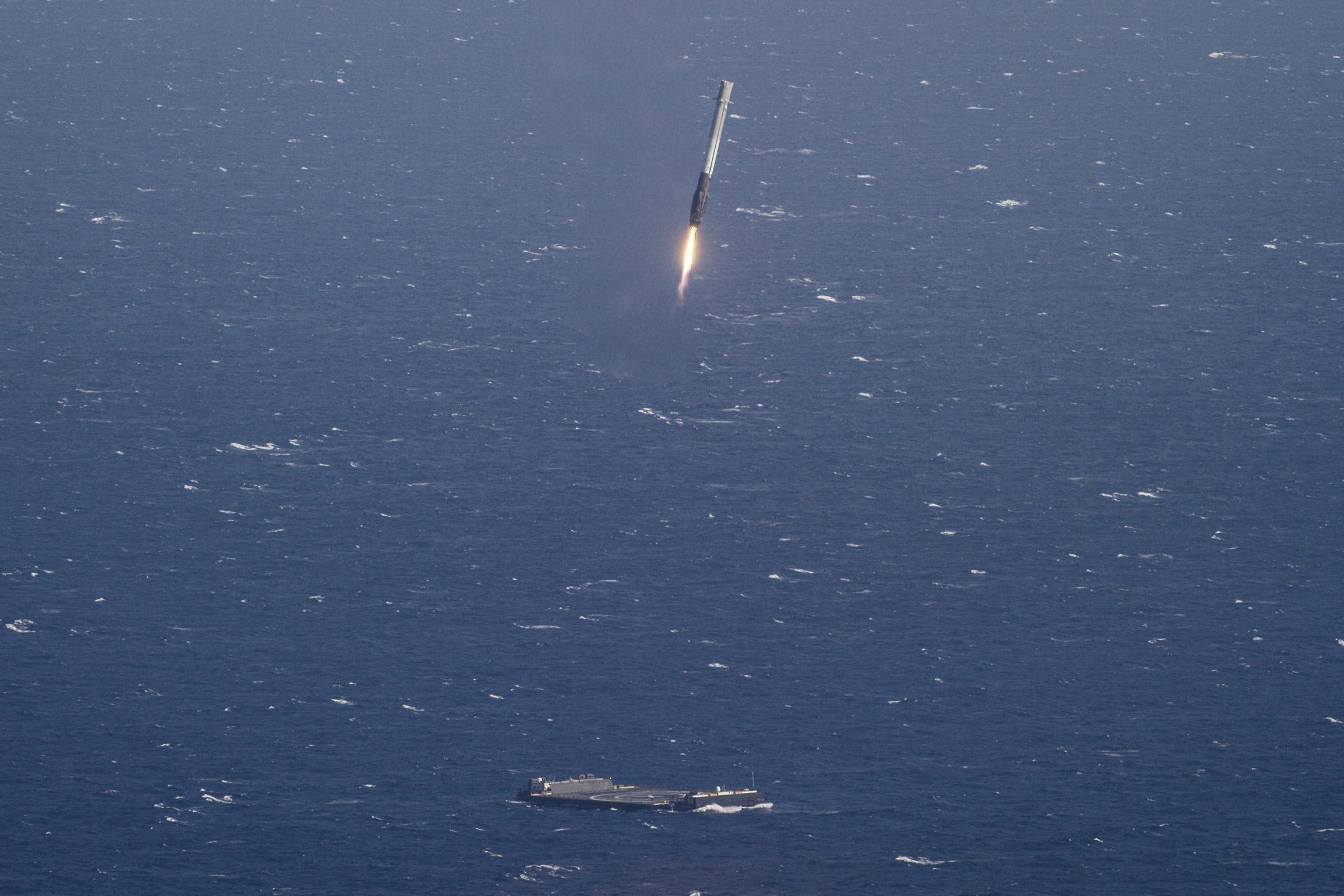 SpaceX Falcon 9 rocket successful landing on a floating platform in the Atlantic Ocean