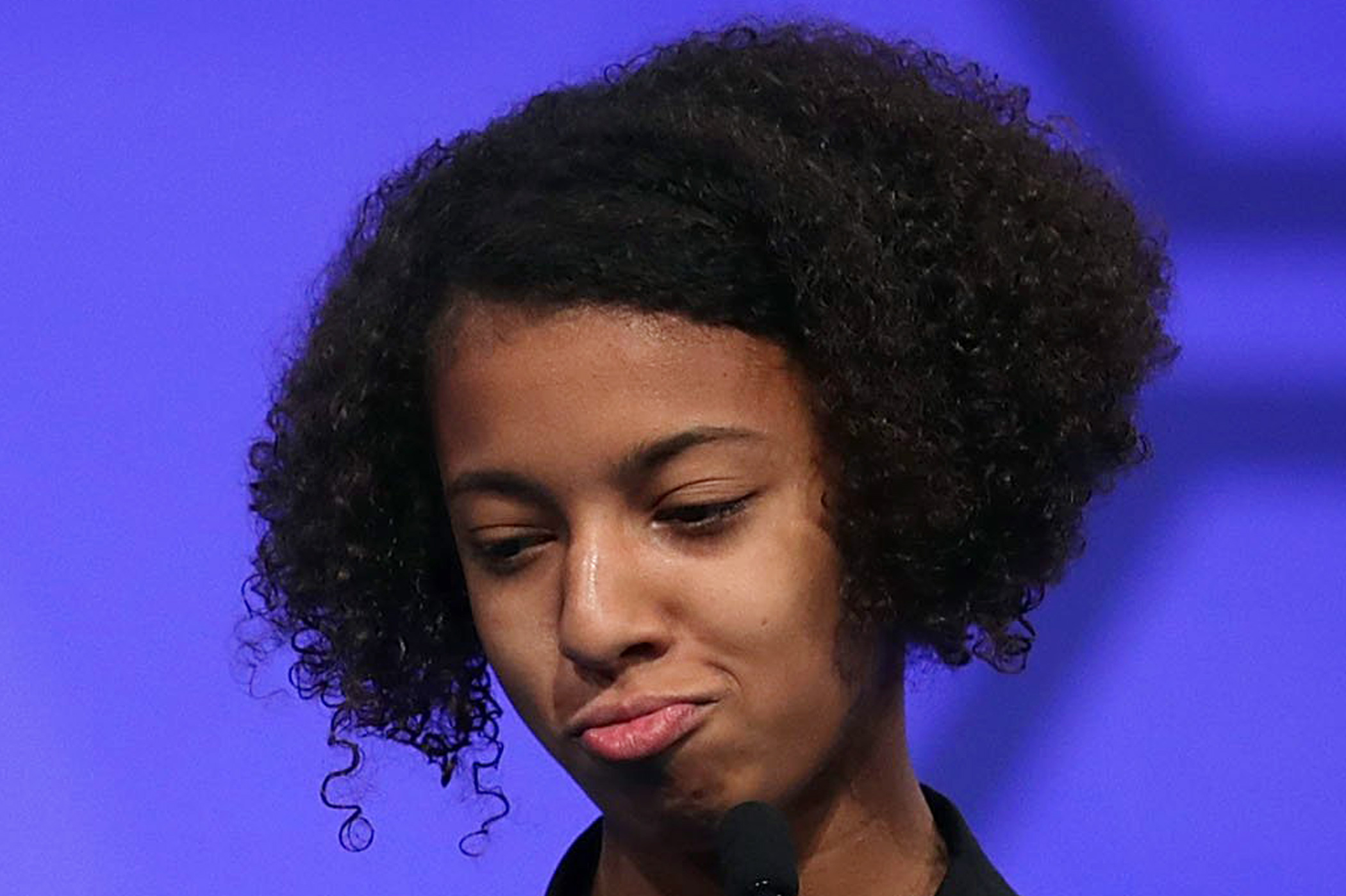 Ameera Waterford of Makawao, Hawaii, reacts after she misspelled her word in the finals of the 2016 Scripps National Spelling Bee on May 26, 2016 in National Harbor, Md.