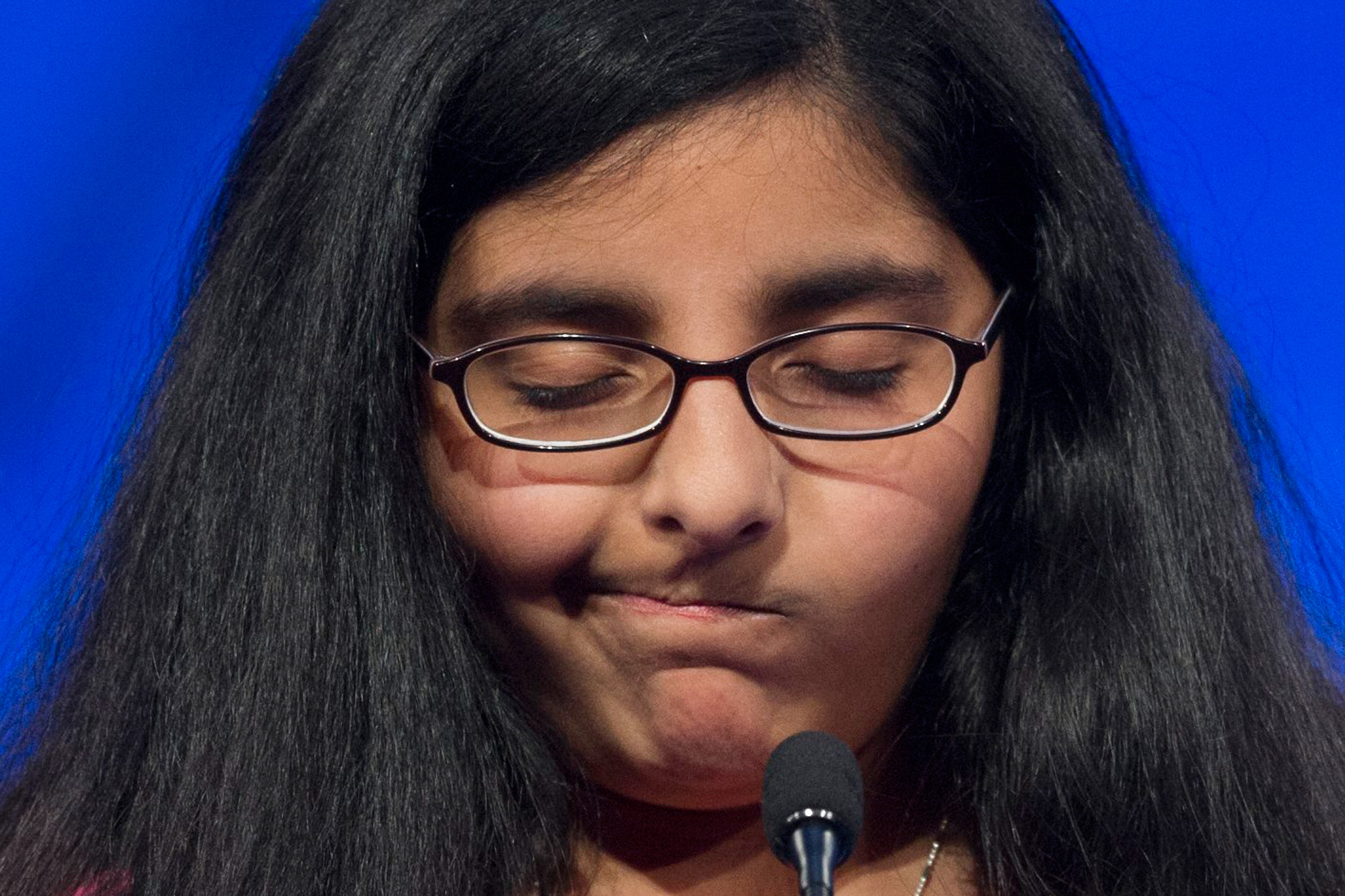 Tara Singh, 11, of Louisville, Ky., incorrectly spells her word during the final round of the Scripps National Spelling Bee in National Harbor, Md., May 26, 2016.