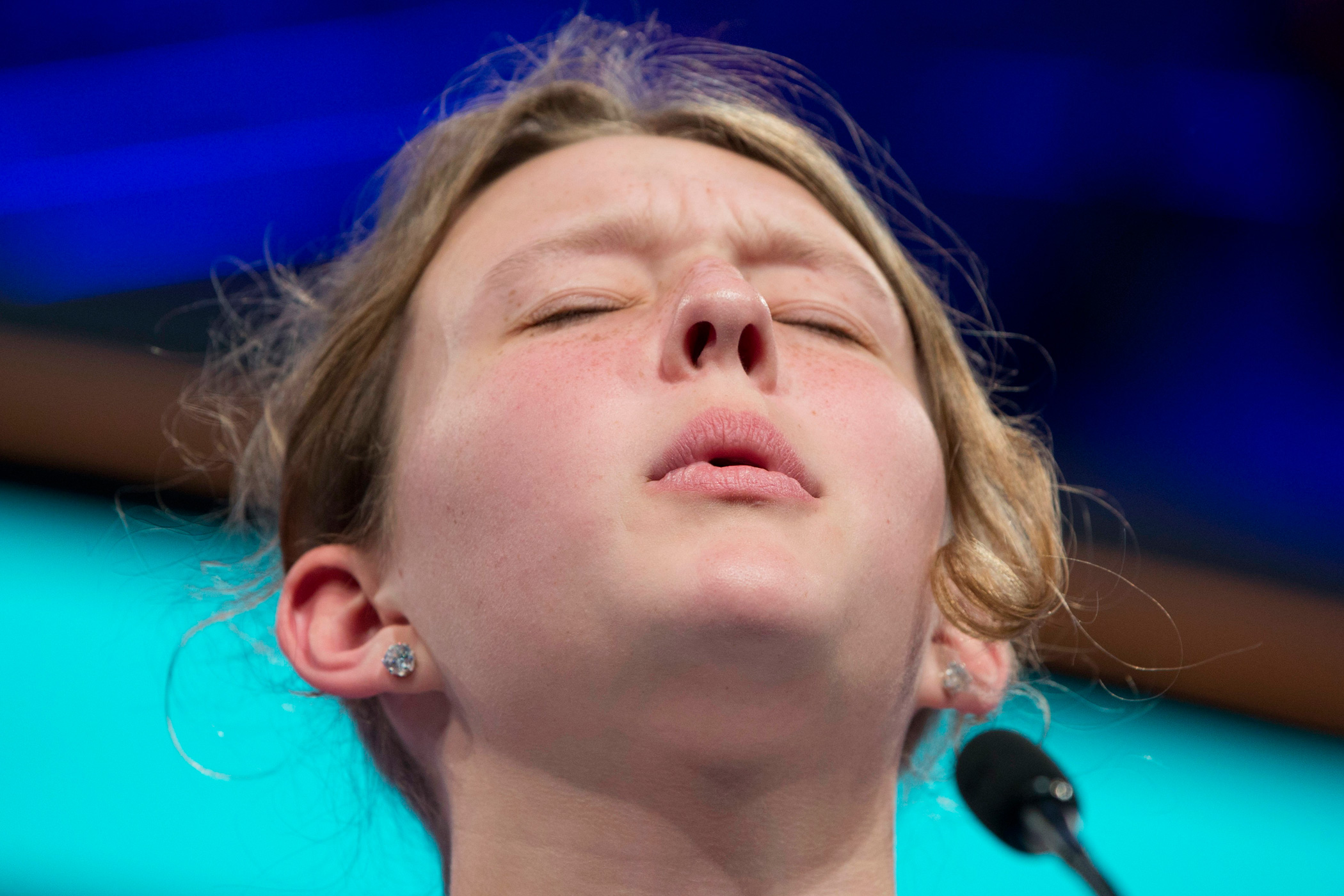 Rachel Rowe, 14, of Parkton, Md., reacts after misspelling her word during the preliminaries of the National Spelling Bee, in National Harbor, Md., May 25, 2016.