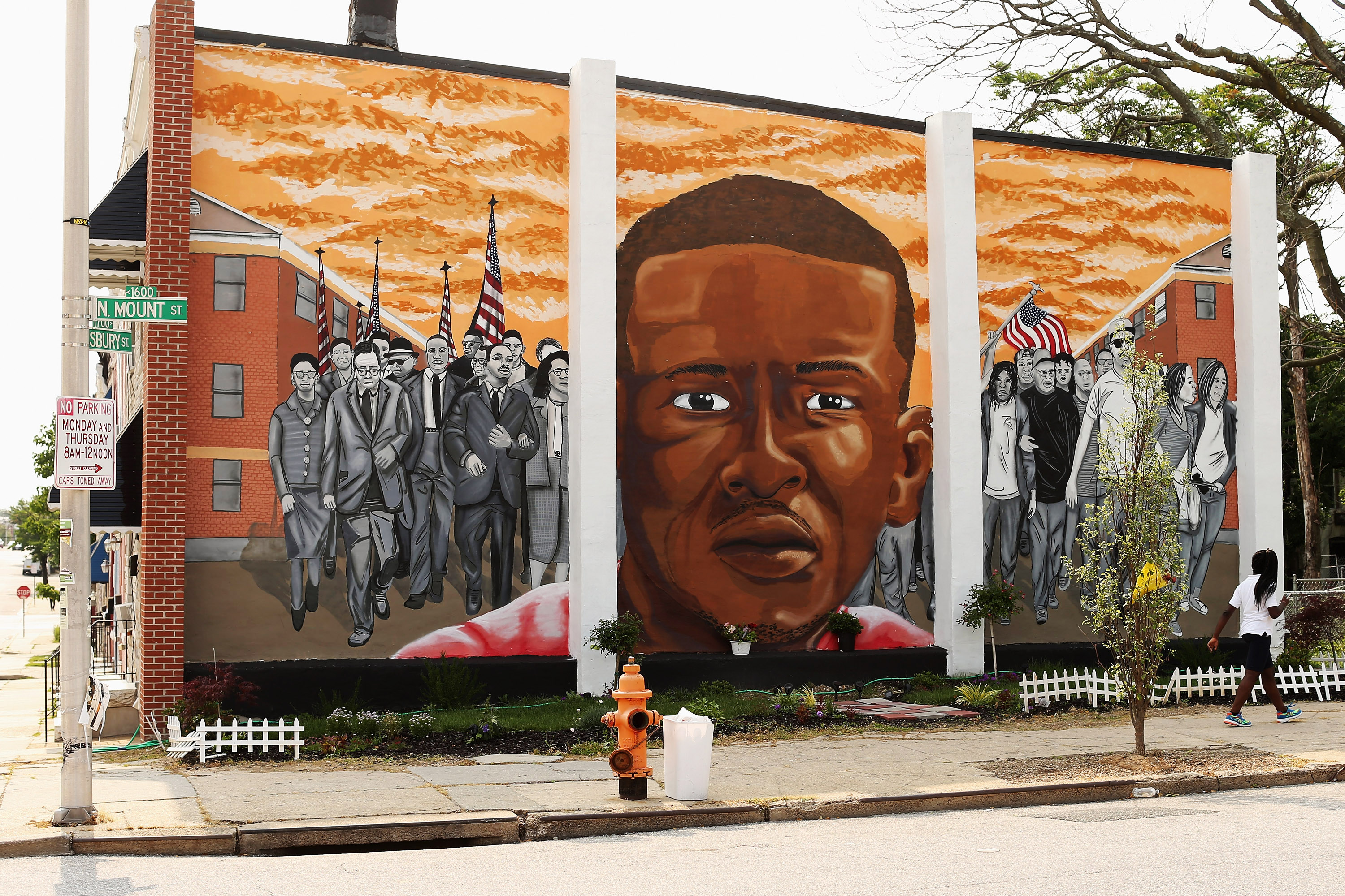 A mural memorializing Baltimore resident Freddie Gray is painted on the wall near the place where he was arrested by police at the Gilmor Homes housing project June 9, 2015 in Baltimore. (Chip Somodevilla—Getty Images)