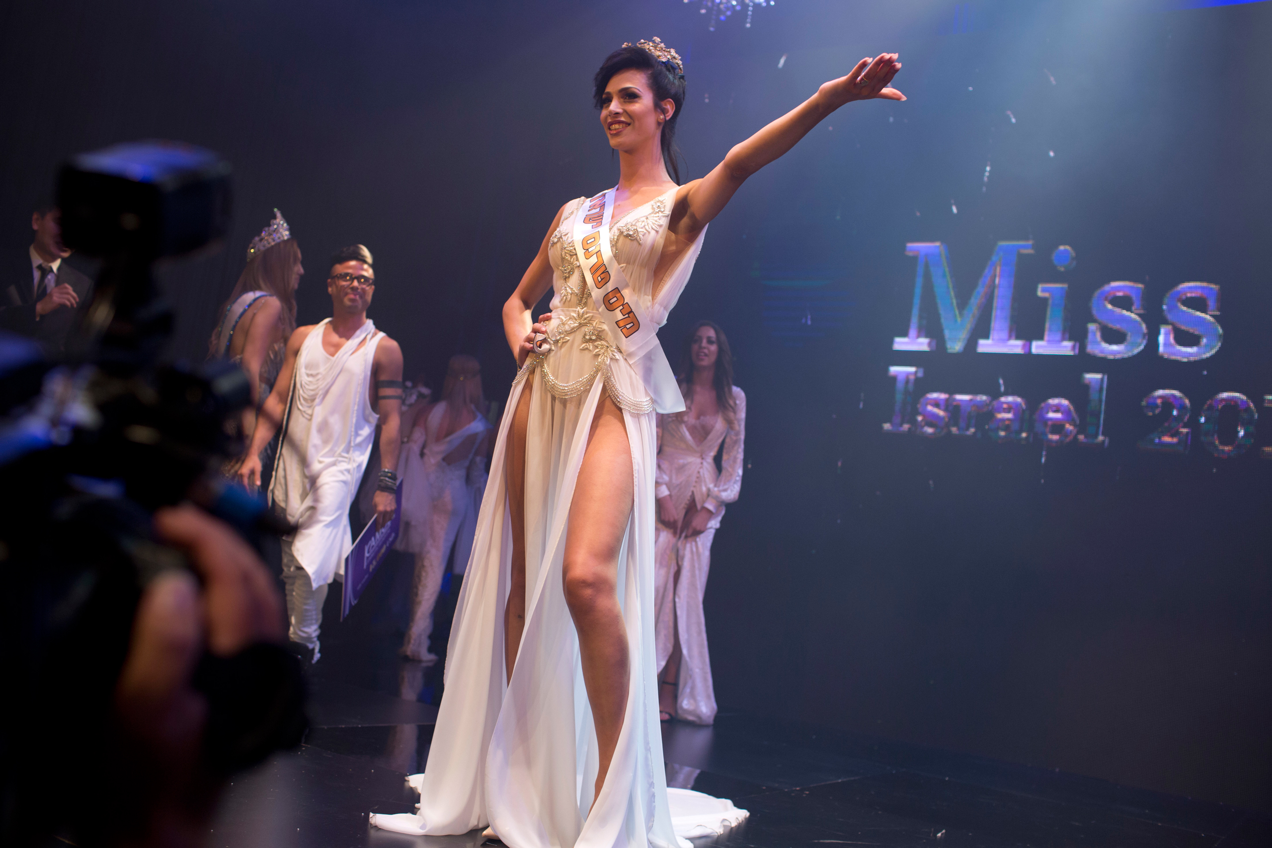 Israeli Arab Talleen Abu Hanna, 21, poses on stage after she was announced as the first Miss Trans Israel beauty pageant, at HaBima, Israel's national theater in Tel Aviv, Israel, Friday, May 27, 2016. Abu Hanna, an Israeli from a Catholic Arab family has been crowned the winner of the country's first transgender pageant. (AP Photo/Oded Balilty)