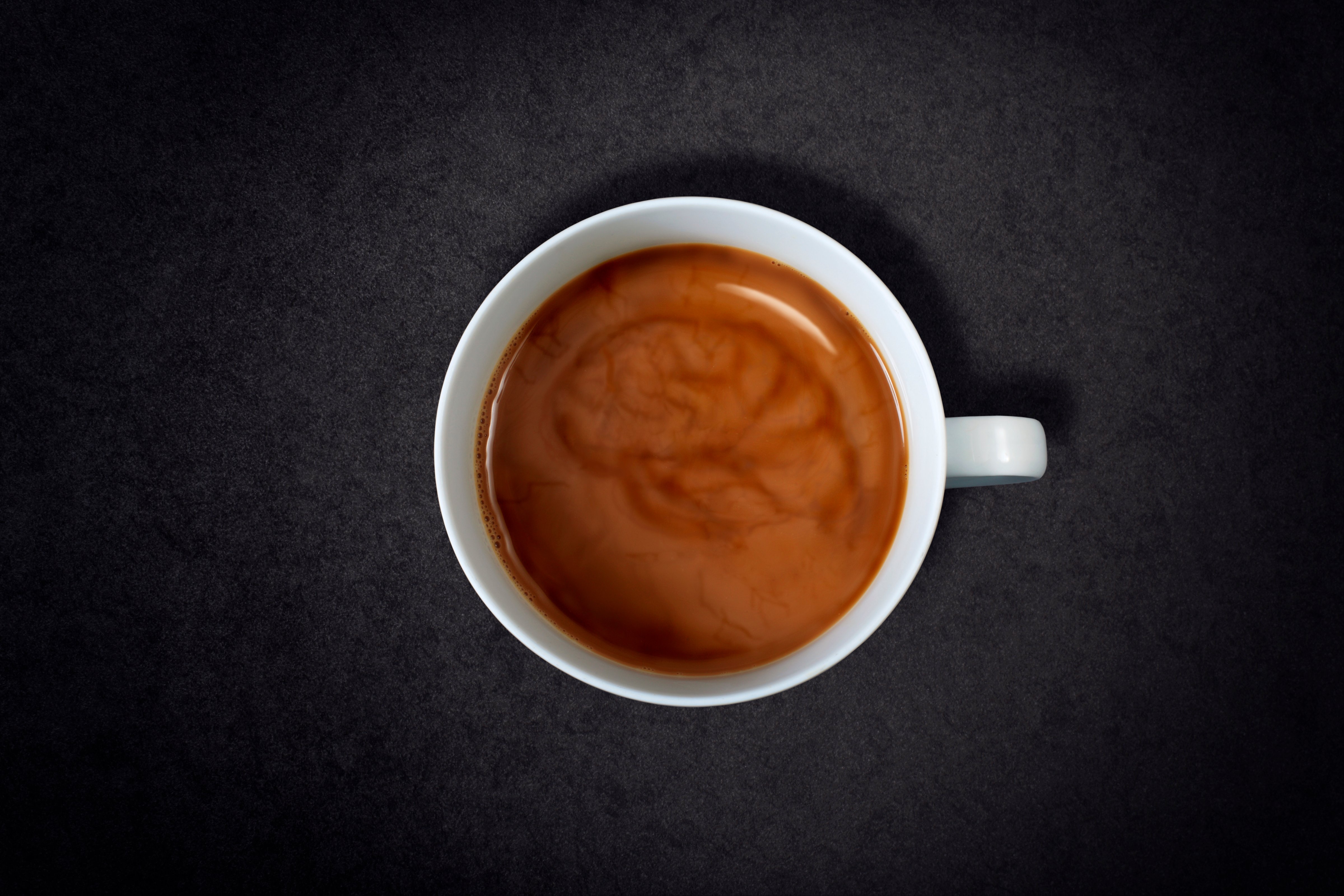 Brain Swirl in a Cup of Coffee (Jan Stromme—Getty Images)