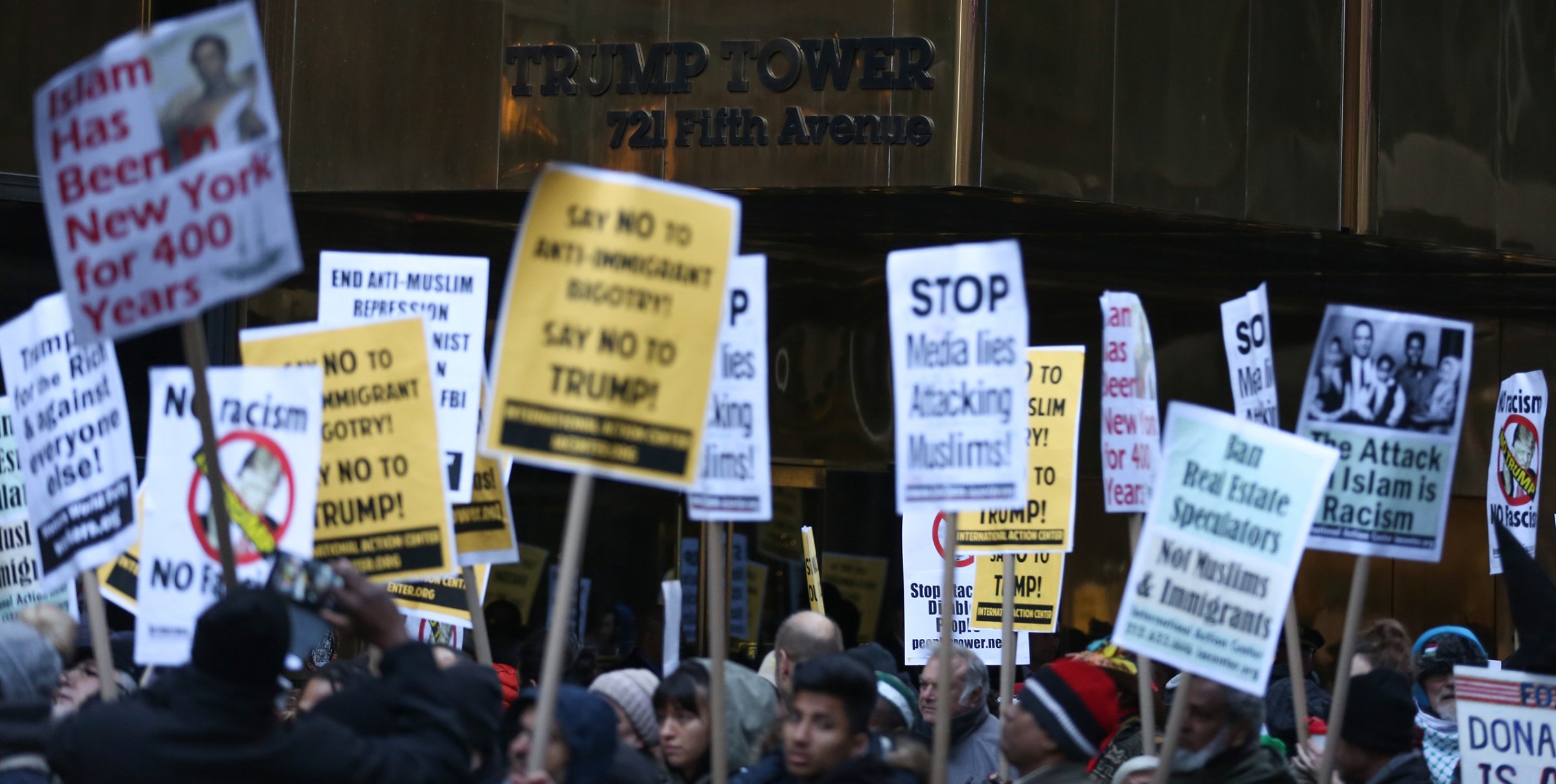 People stage a protest against Donald Trump after he made comments stating that he wants a 'total and complete shutdown of Muslims entering the United States' in front of the Trump Tower at 5th Avenue in New York City on Dec. 20, 2015.