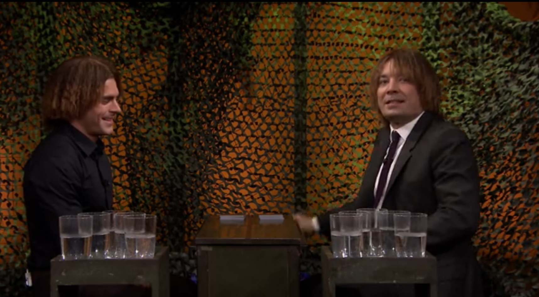 Jimmy and Zac Efron face off in a twist on the card game War, where the loser of each hand faces wet consequences on The Tonight Show Starring Jimmy Fallon on May 18, 2016.