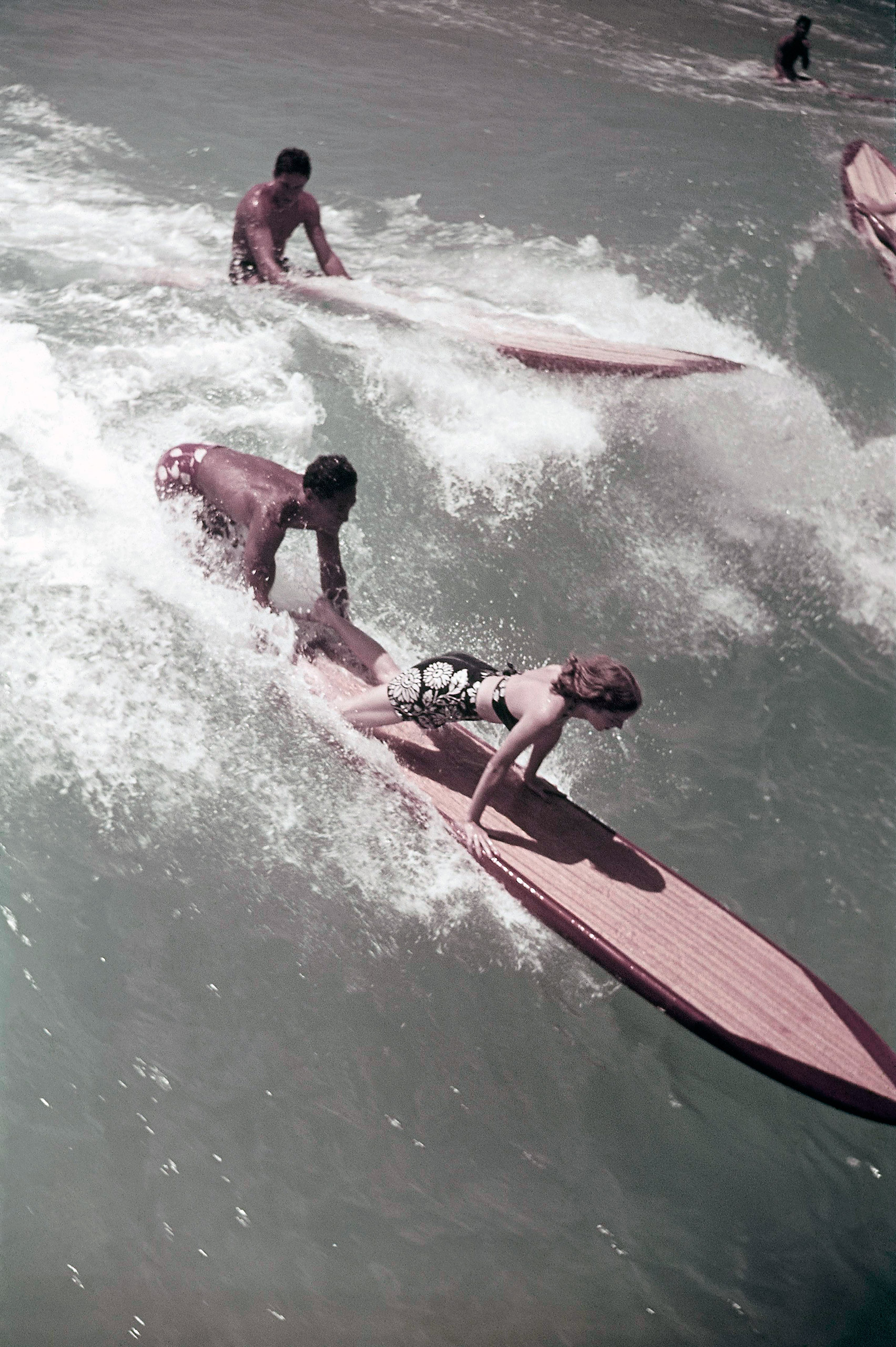 Surfers in the water in Hawaii, 1938.