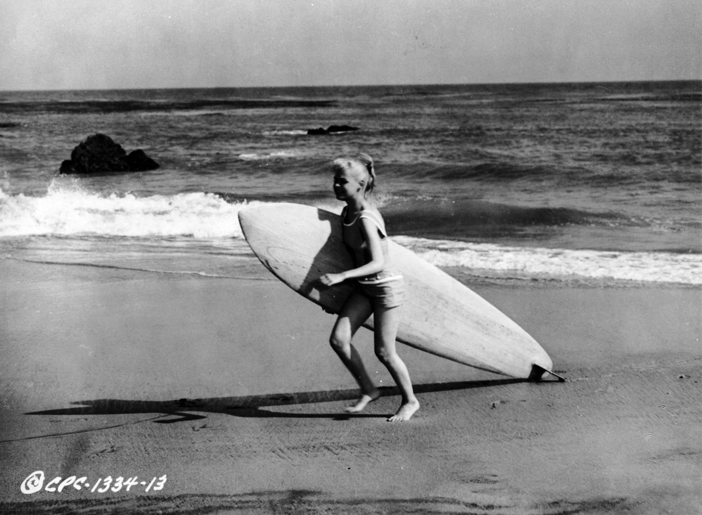 Vintage photos of surfer girls for International Surfing Day.