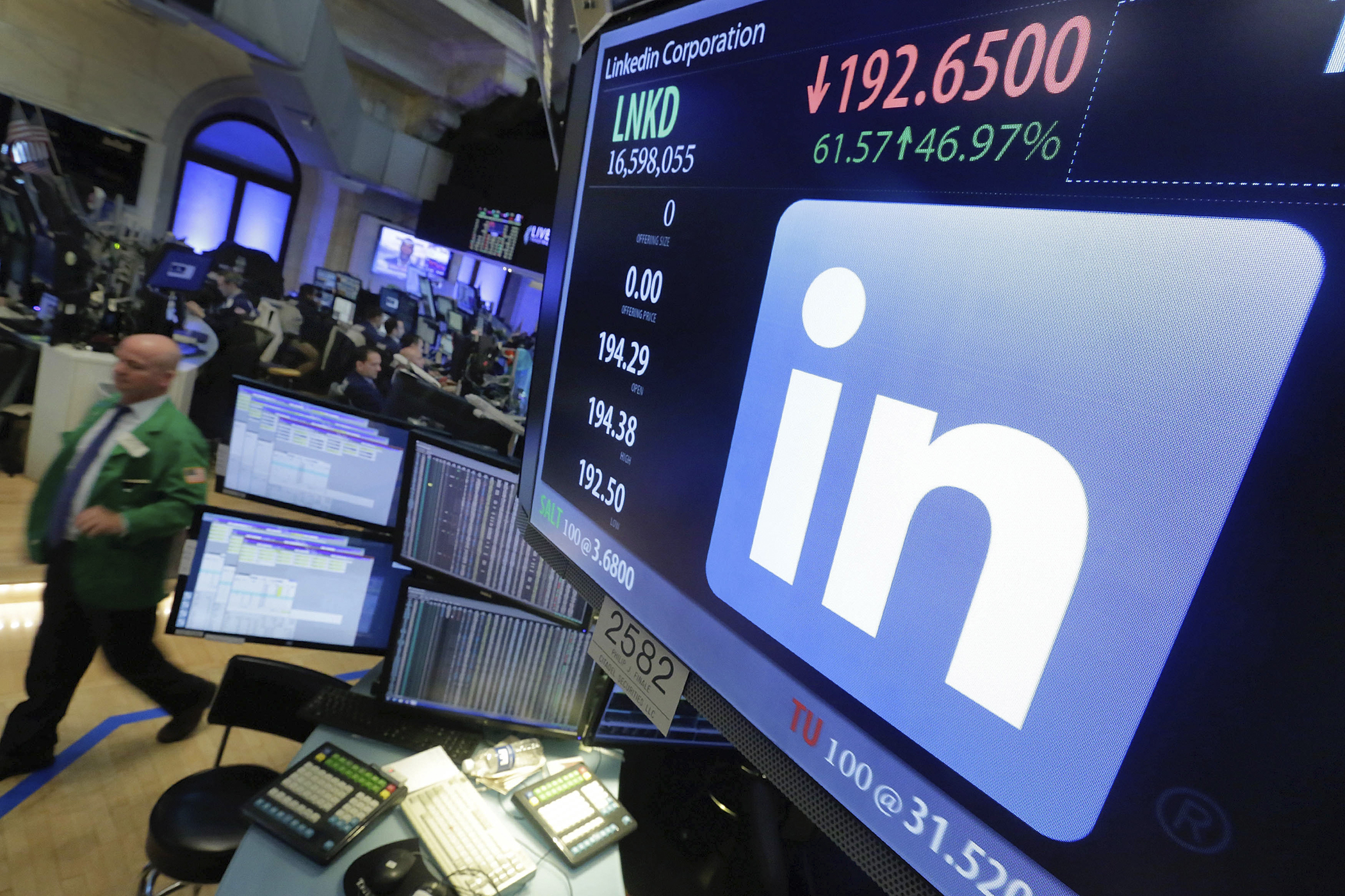 The LinkeIn logo appears on a screen at the post where it trades on the floor of the New York Stock Exchange, June 13, 2016. In a surprise move, Microsoft said Monday that it is buying professional networking service site LinkedIn for about $26.2 billion. (Richard Drew&mdash;AP)
