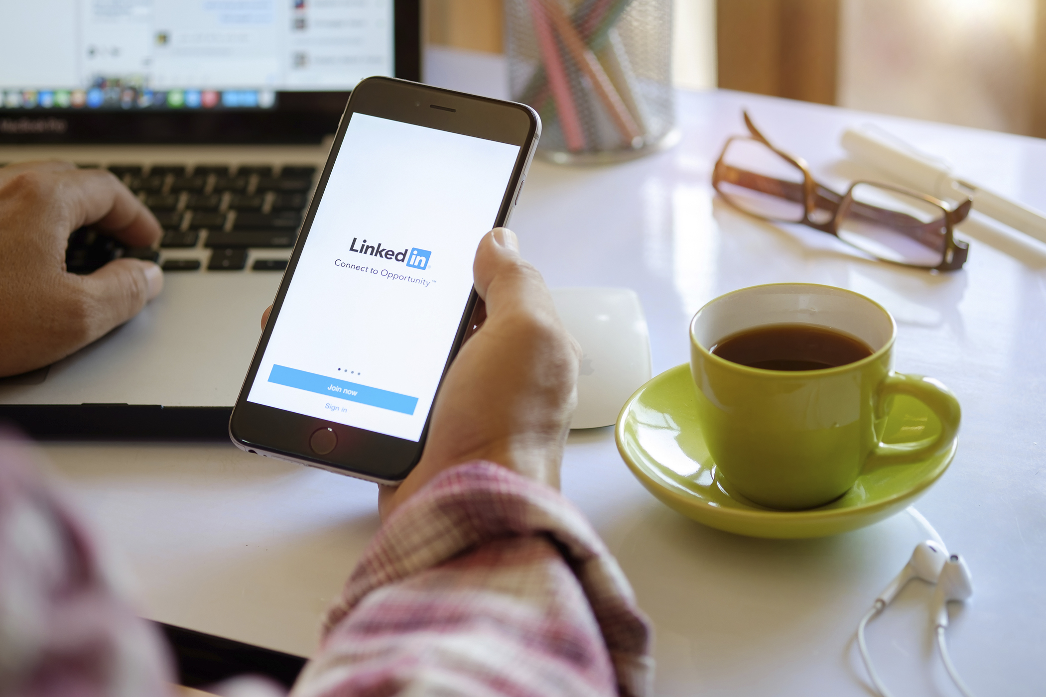 iPhone 6 Plus with LinkedIn on the screen (Shutterstock)