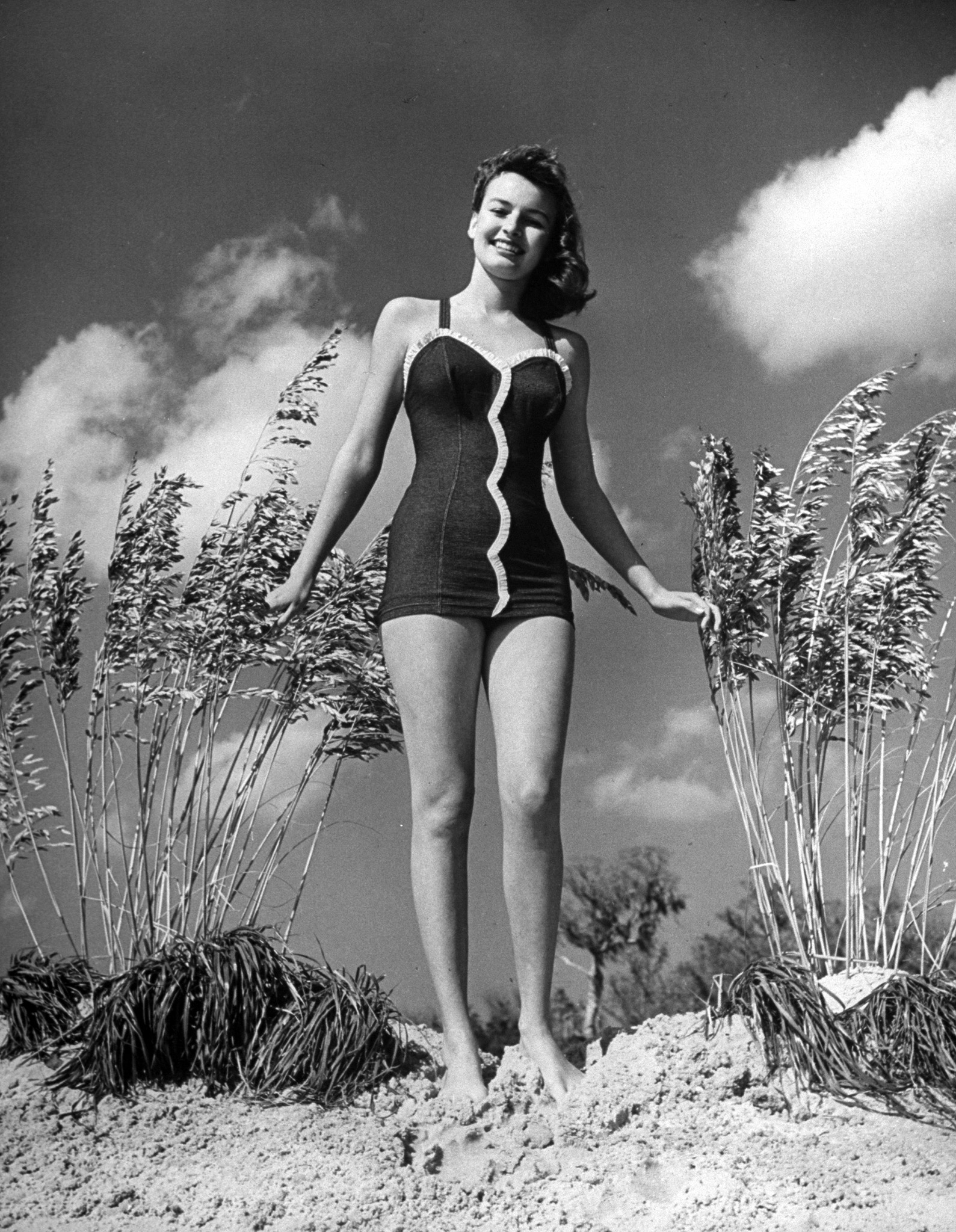 Model posing in bathing suit in Florida, circa 1945.