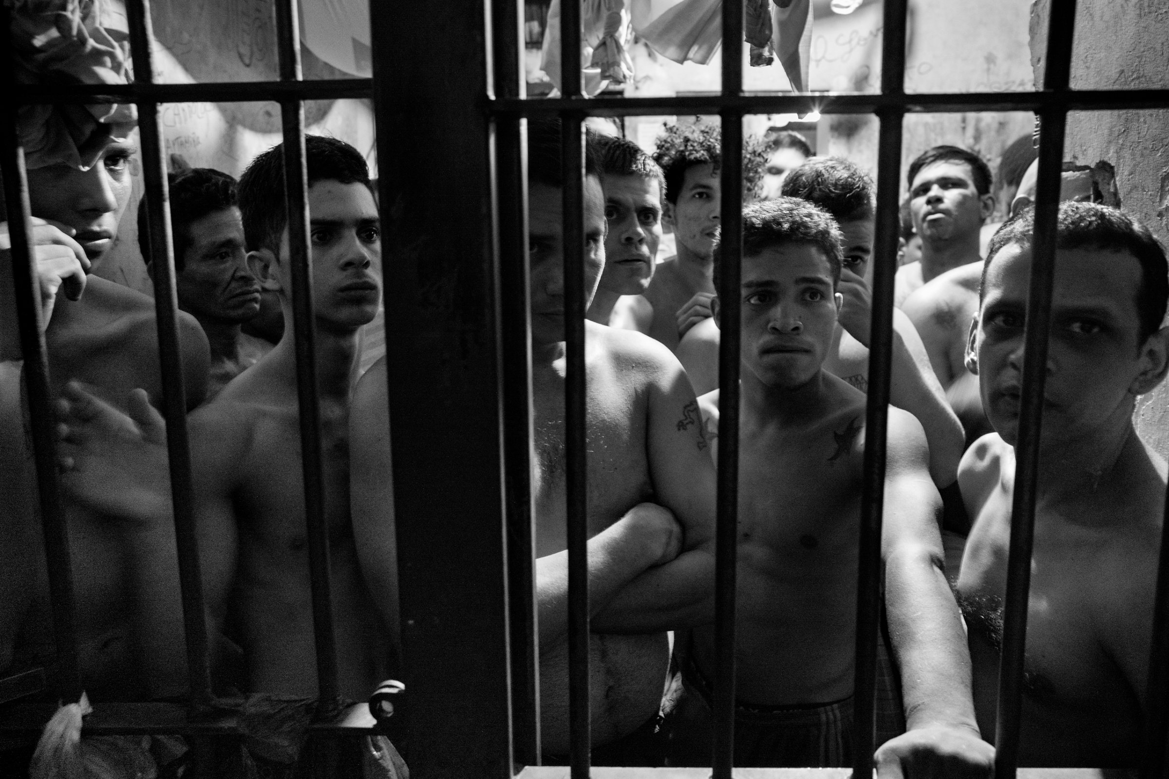 A group of prisoners locked in their cells inside the municipal police station of Chacao, east of Caracas, Venezuela, May 27, 2016.