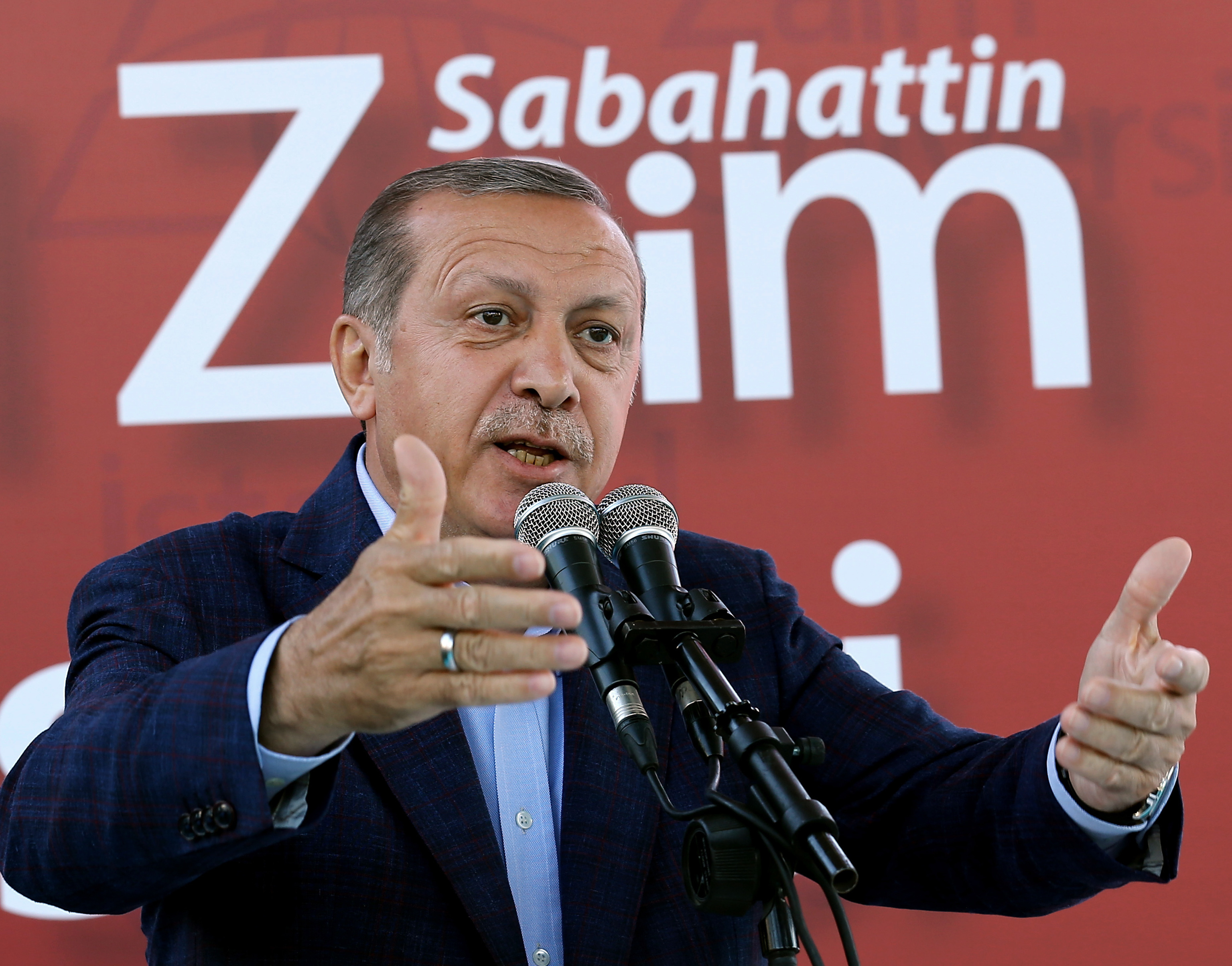 Turkey's President Recep Tayyip Erdogan says work is no reason for women to decline motherhood 
                      in his speech at the Sabahattin Zaim University in Istanbul on June 5, 2016 (Yasin Bulbul—AP)