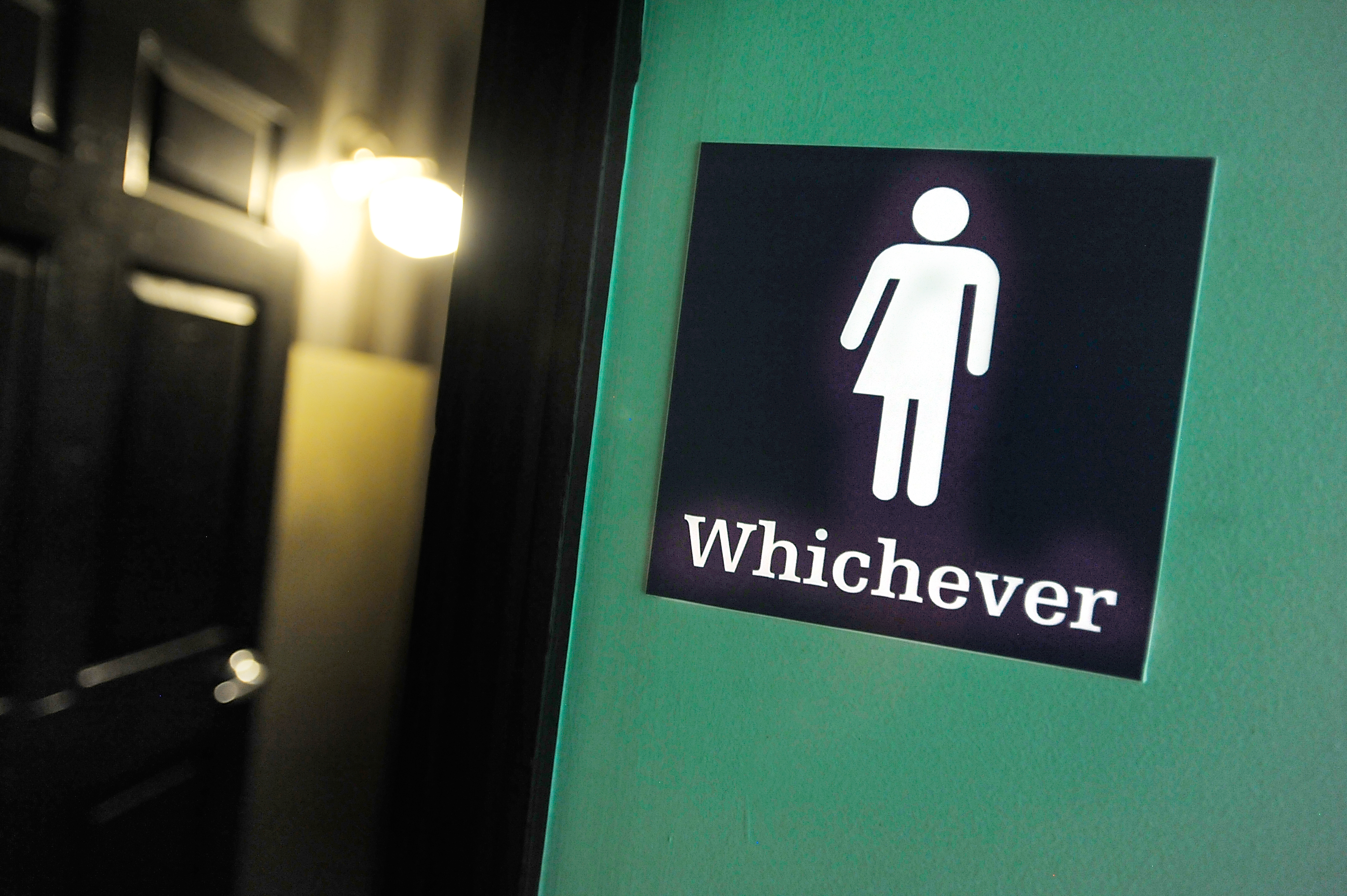 A gender neutral sign is posted outside a bathrooms at Oval Park Grill on May 11, 2016 in Durham, North Carolina. (Sara D. Davis&mdash;Getty Images)