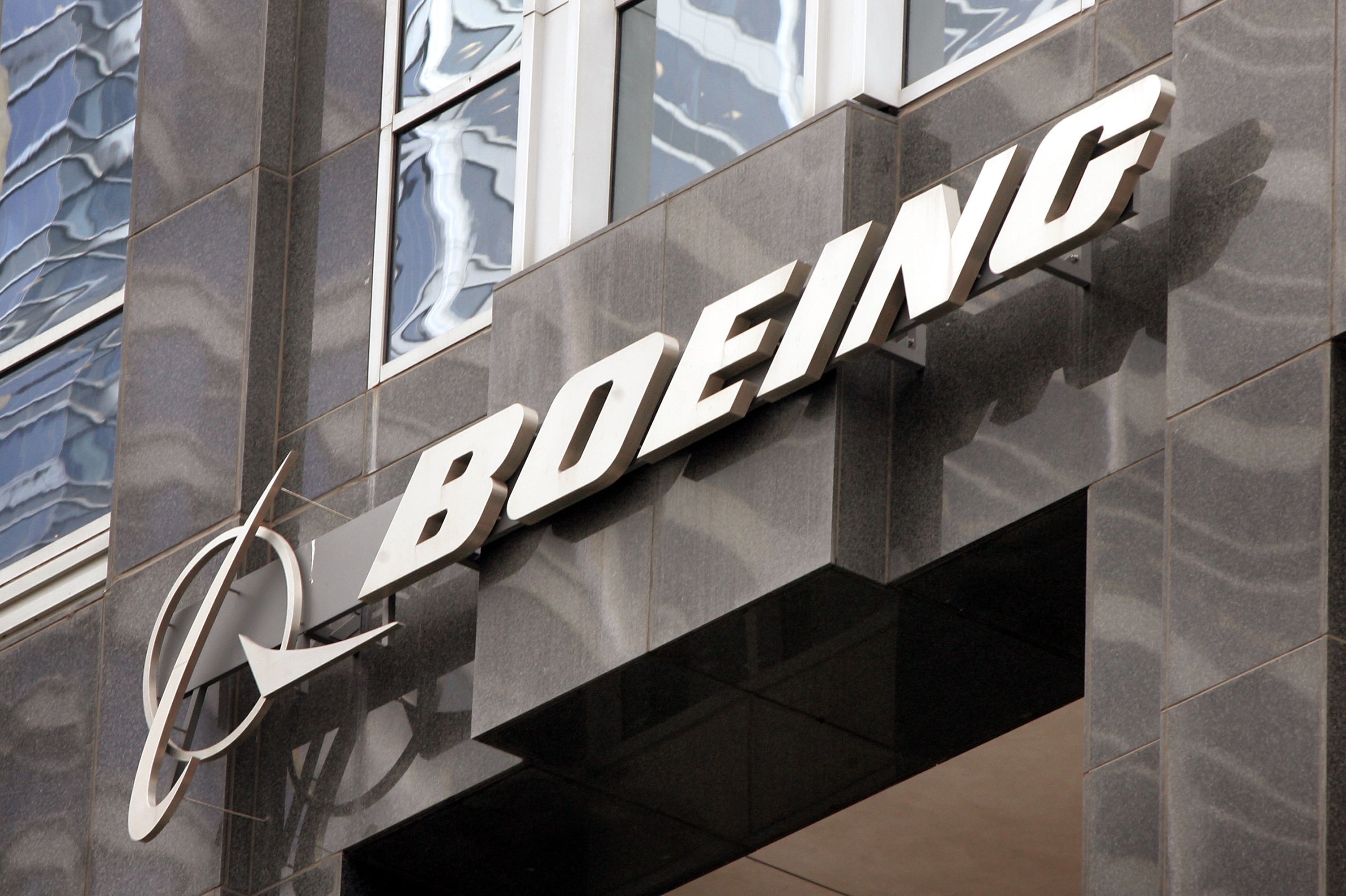 The Boeing logo hangs on the corporate world headquarters building of Boeing November 28, 2006 in Chicago, Illinois. (Scott Olson—Getty Images)