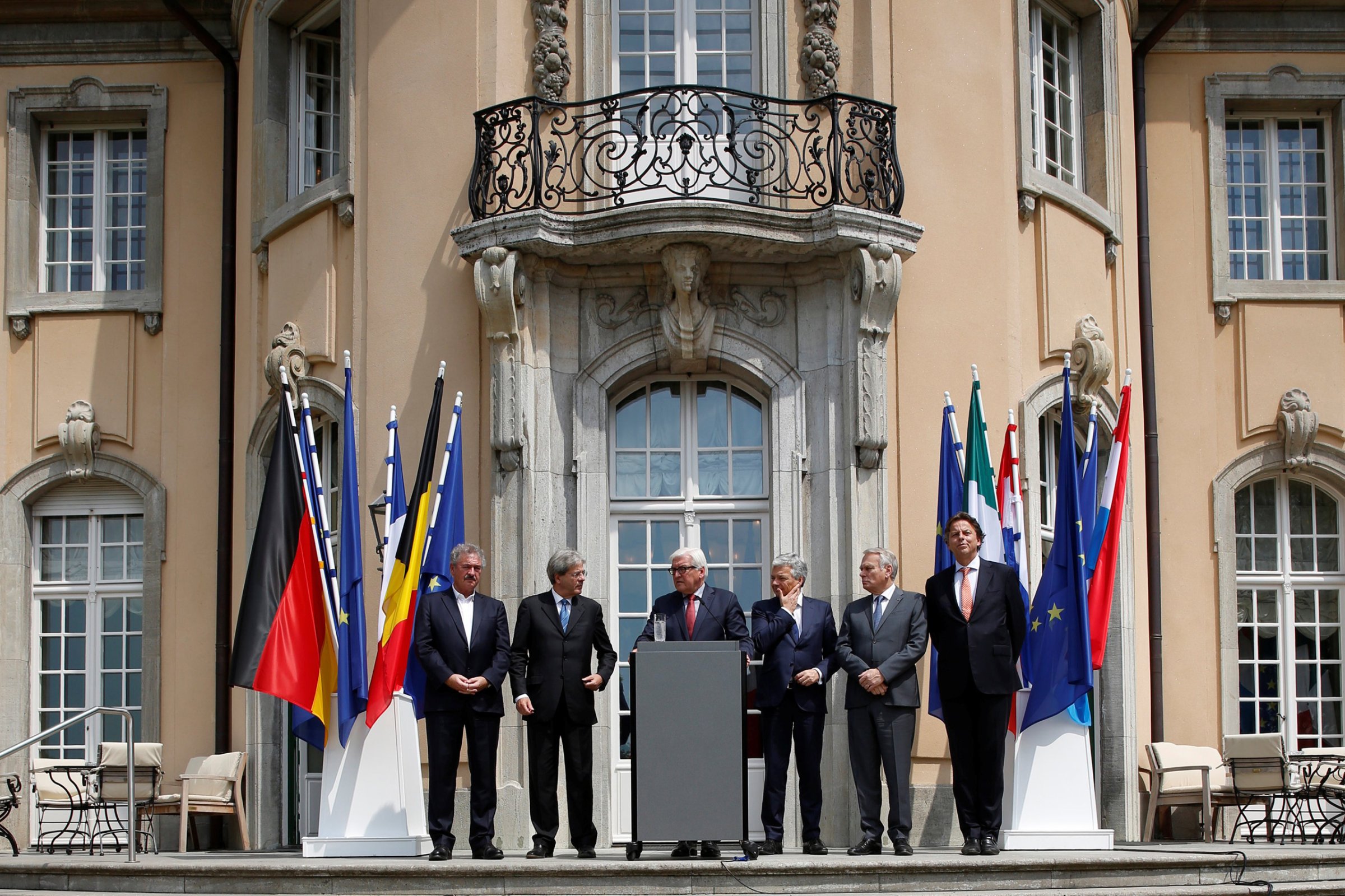 Luxembourg's Foreign Minister Jean Asselborn, Italian Foreign Minister Paolo Gentiloni, German Foreign Minister Frank-Walter Steinmeier, Belgian Foreign Minister Didier Reynders, French Foreign Minister Jean-Marc Ayrault and Dutch Foreign Minister Bert Koenders (L-R) attend a press conference after a foreign minister meeting of the EU founding members in Berlin on June 25, 2016.
