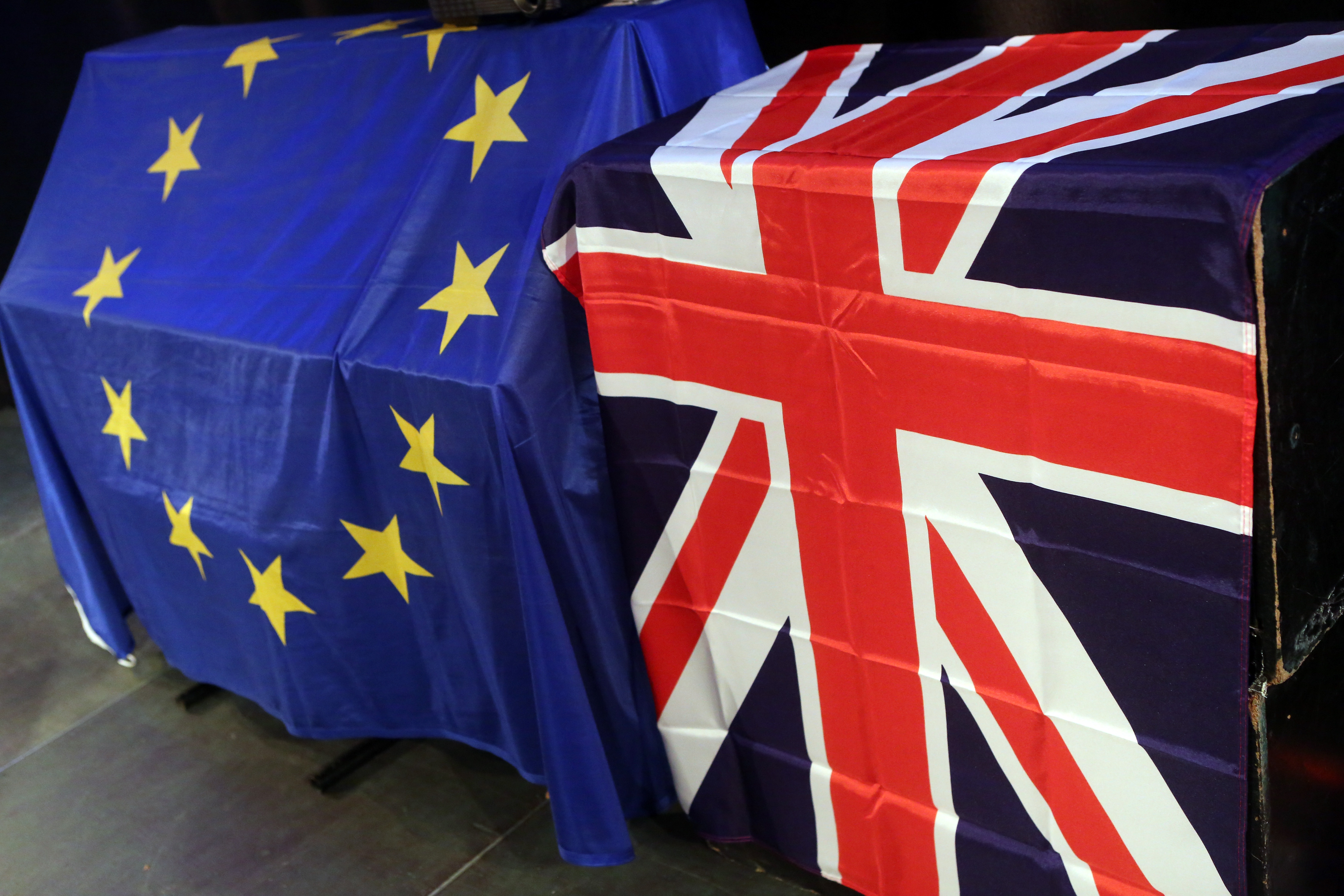 European Union and British Union Jack flags hang at a meeting for British citizens living in Germany to discuss the implications of Great Britain leaving the European Union, known popularly as Brexit, on May 26, 2016 in Berlin, Germany. (Adam Berry—Getty Images)
