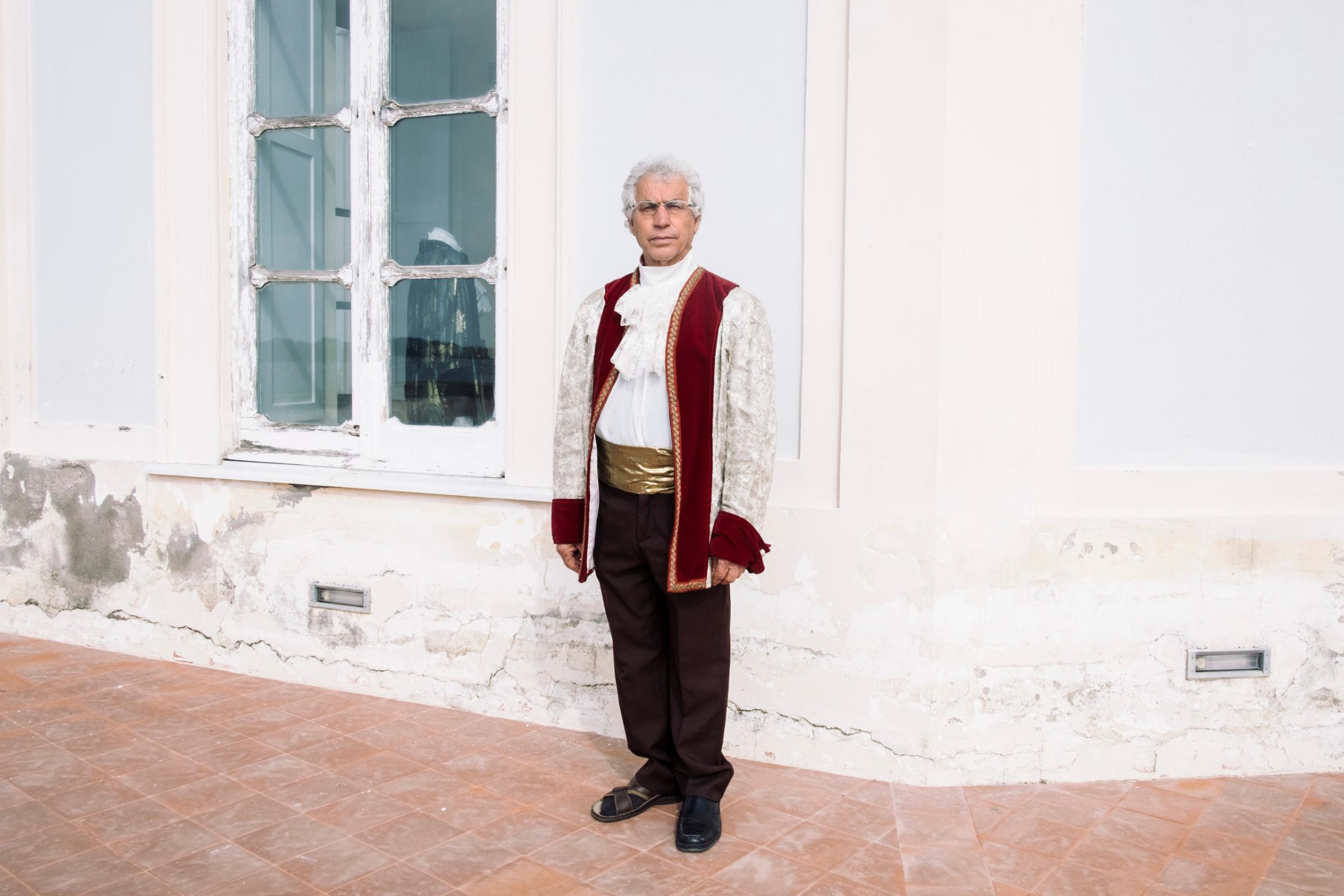 A local volunteer tour guide at the Casina Vanvitelliana, in Bacoli, March, 2016. The Casina Vanvitelliana was a Bourbon hunting and fishing house built on top of a little island in Lake Fusaro.