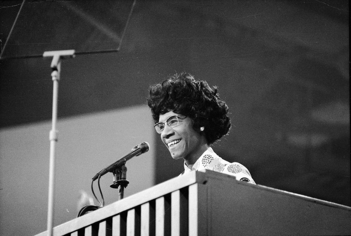 Congresswoman Shirley Chisholm speaks at a podium at the Democratic National Convention, Miami Beach, Florida, July 1972. (Pictorial Parade / Getty Images)