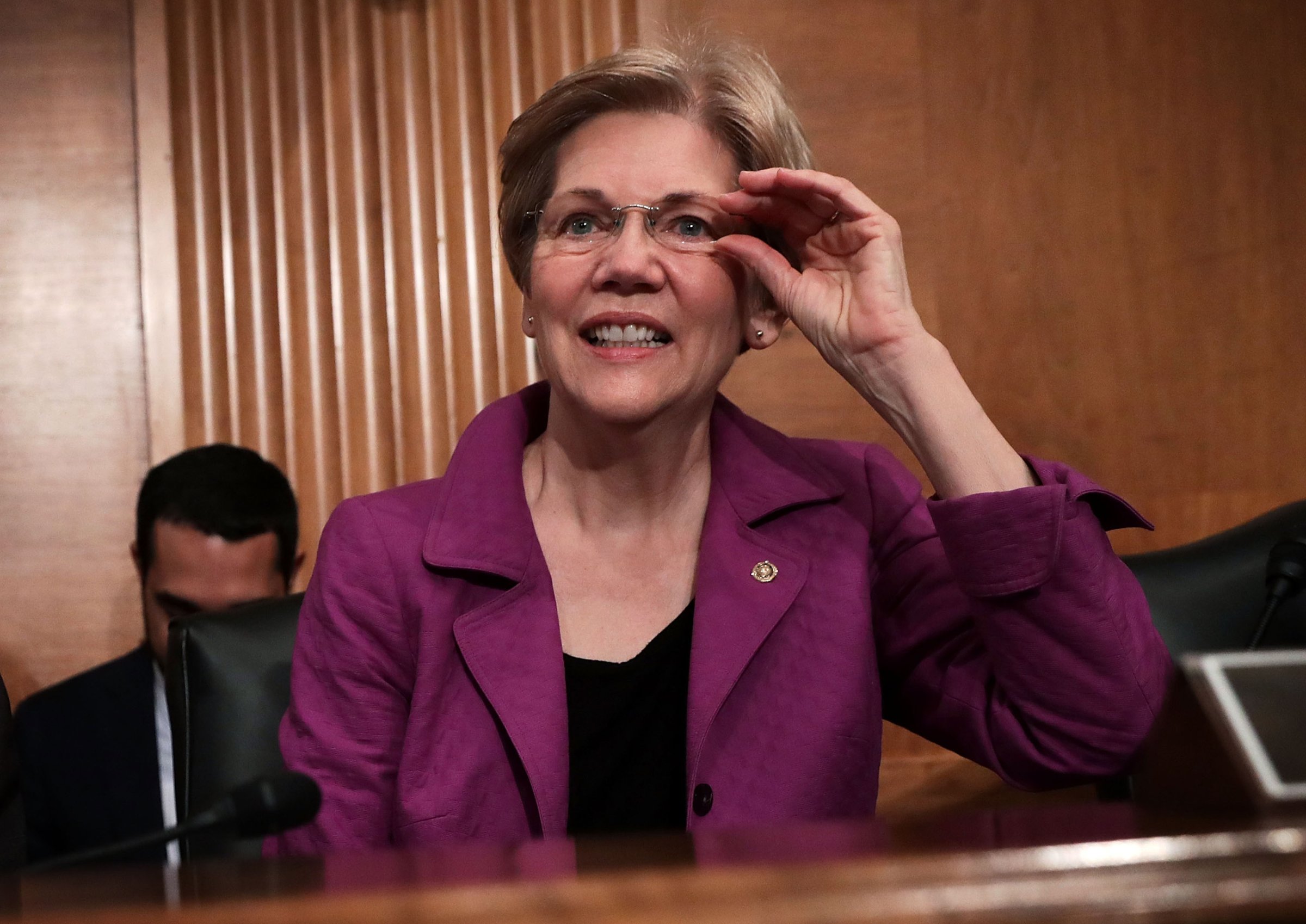 Sen. Elizabeth Warren waits for the beginning of a hearing before the Senate Banking, Housing and Urban Affairs Committee in Washington, D.C., April 7, 2016.