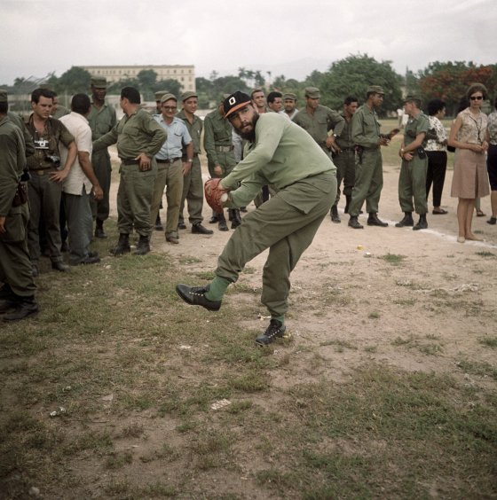 Cuban leader Fidel Castro winds up to throw a baseball in 1964.