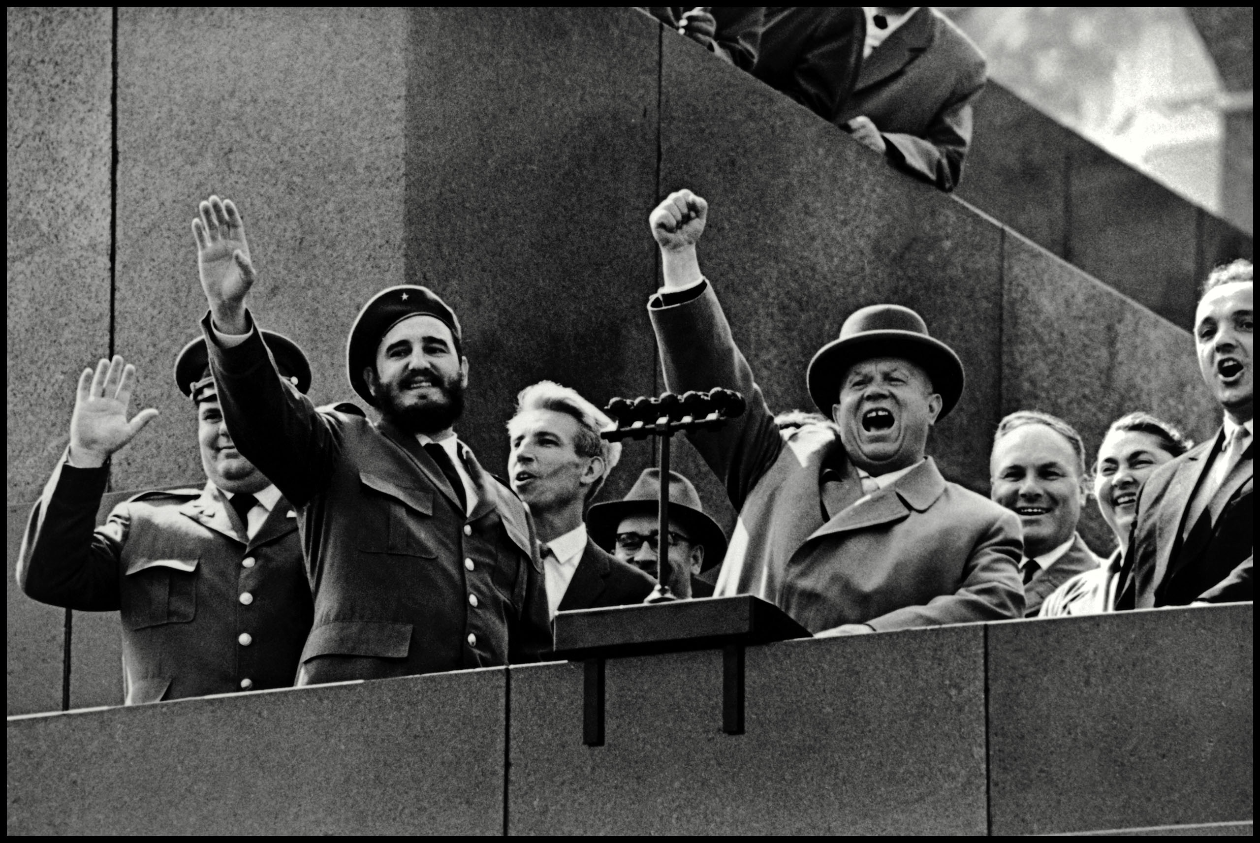 At the height of the Soviet-Cuban cooperation, Nikita Khrushchev welcomes Cuban President Fidel Castro at the podium of the Kremlin in front of the Red Square in Moscow, 1961.
