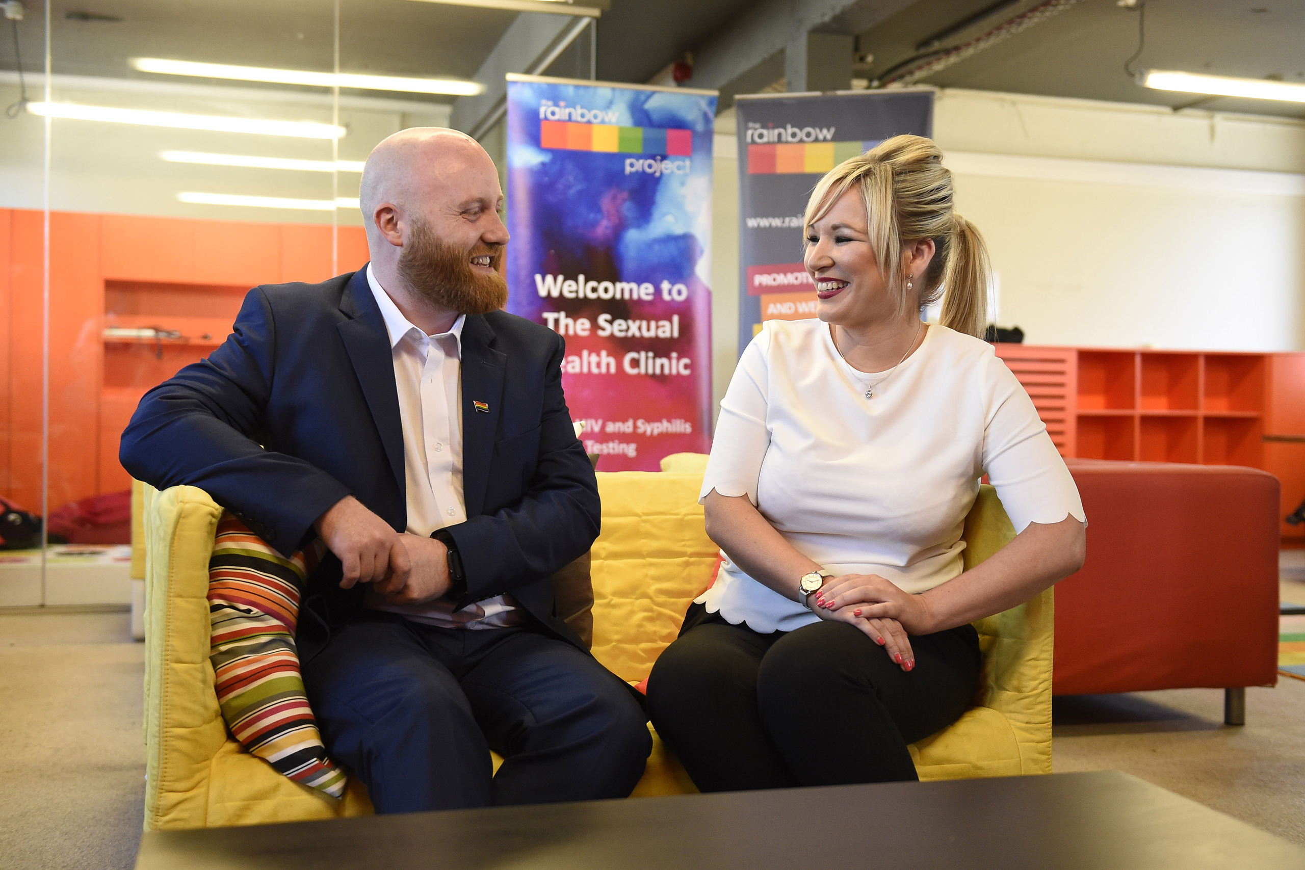Health Minister Michelle O'Neill with John O'Doherty from The Rainbow Project which supports the LGBT community, at the organization's offices in Belfast, June 2, 2016. (Michael Cooper—PA Wire/AP)