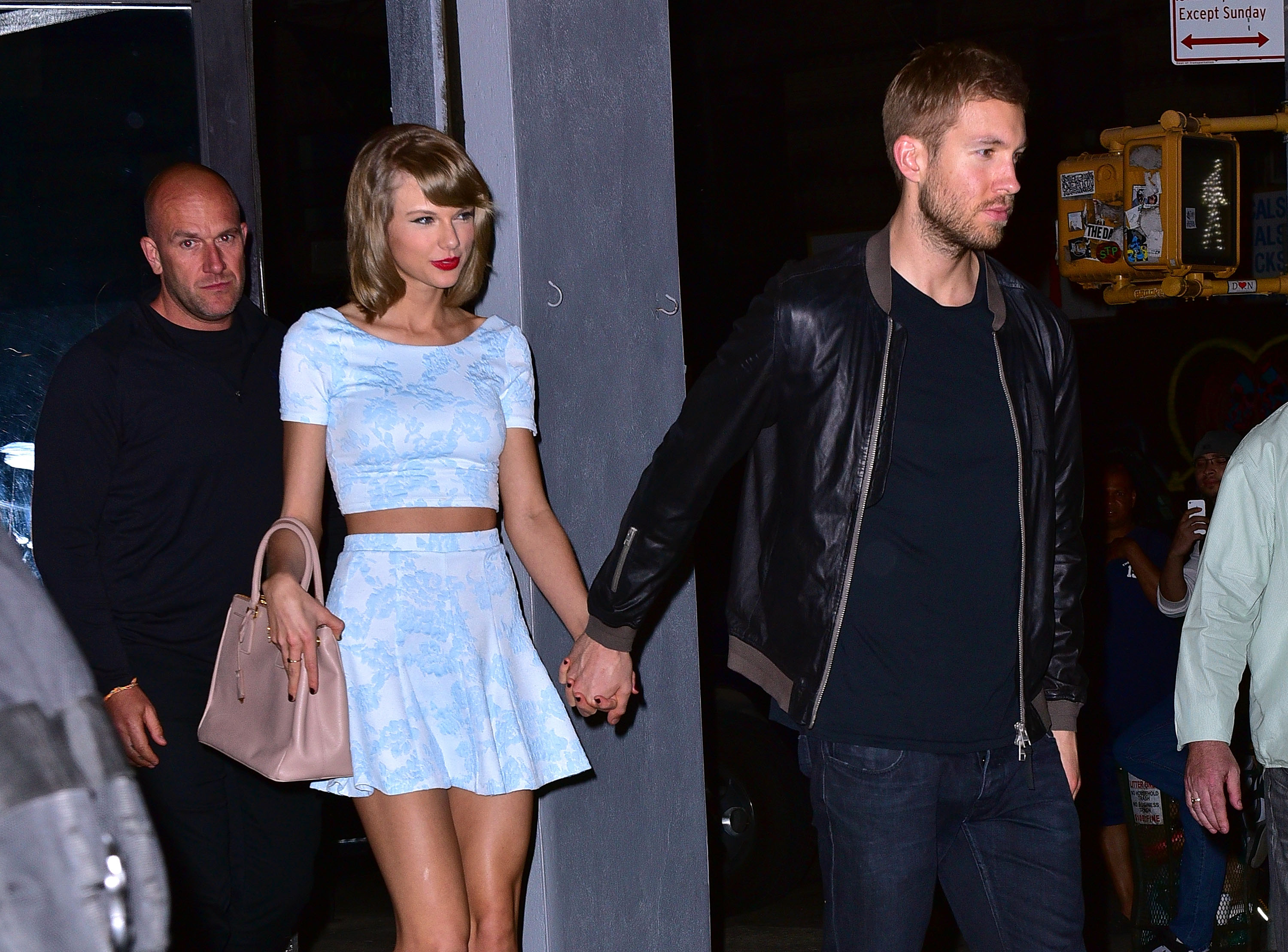 Taylor Swift and Calvin Harris leave L'asso restaurant on May 26, 2015 in New York City. (James Devaney—GC Images/Getty Images)
