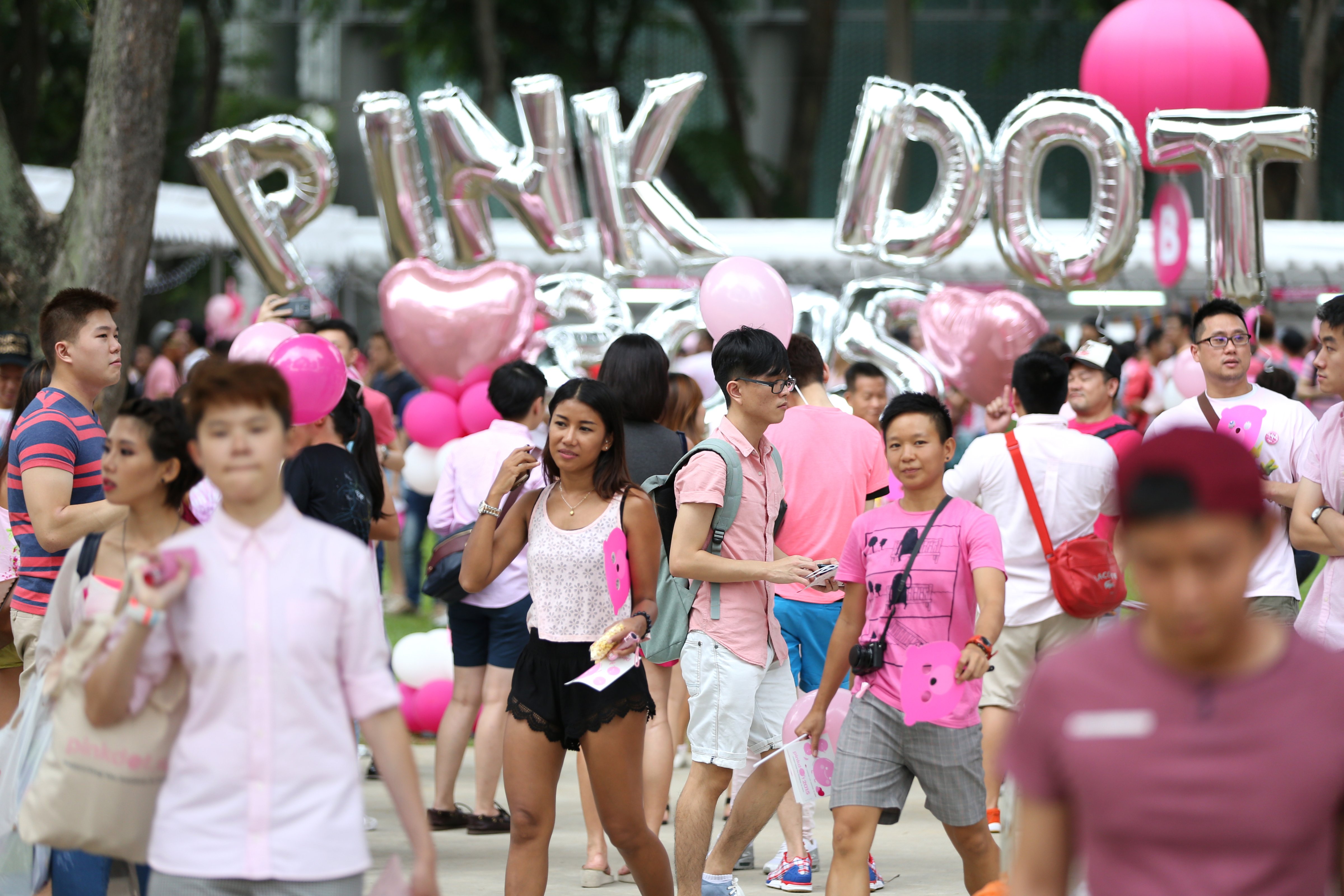People dressed in various shades of pink attend Pink Dot SG on June 13, 2015 in Singapore (Lionel Ng&mdash;Getty Images)