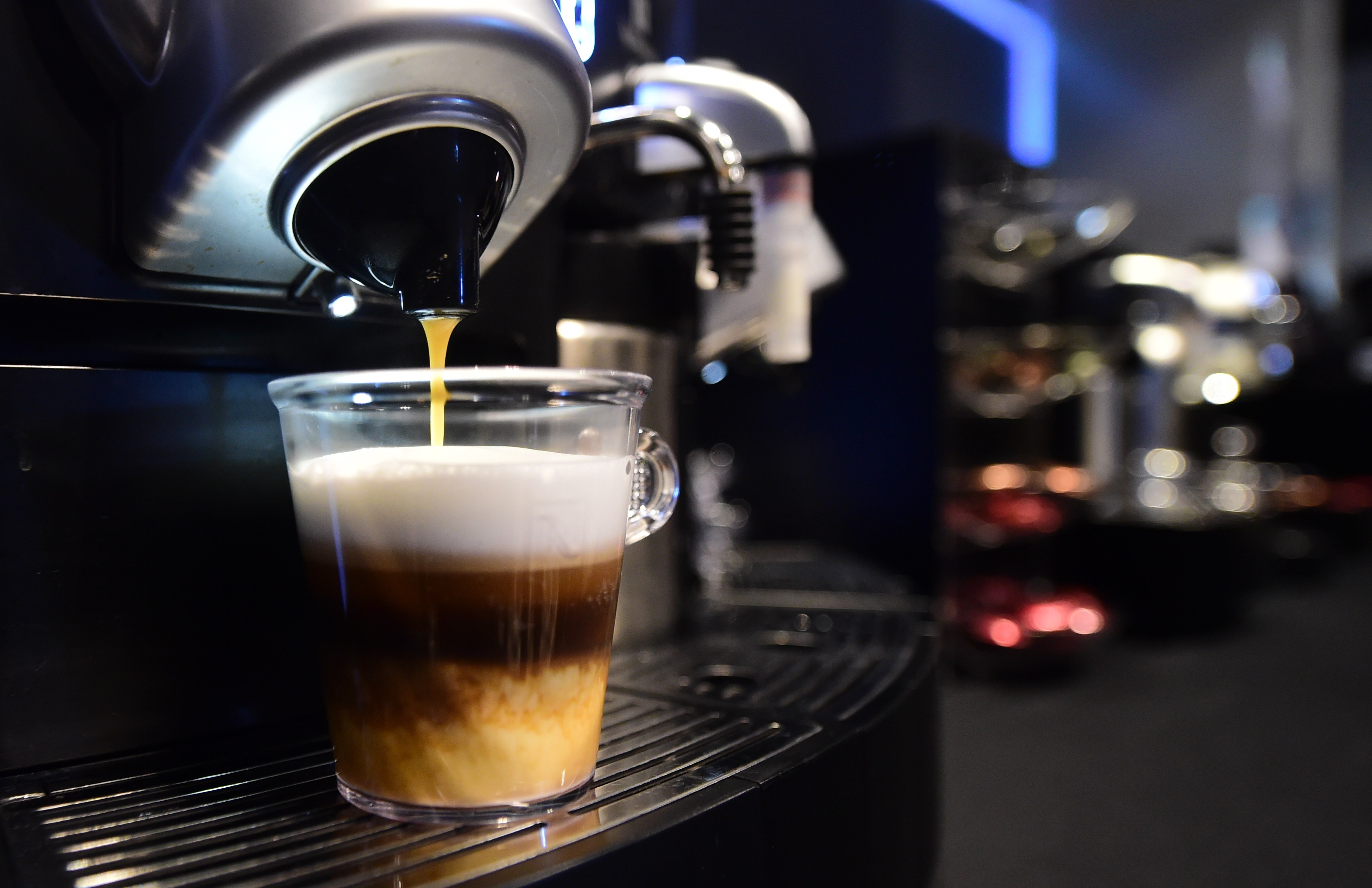 A triple-layered espresso from Nespresso's Gemini CS200 pro coffee machine is prepared at The Luxury Technology Show, produced by RAND Luxury in Hollywood, California on September 30, 2015 (Frederic J. Brown—AFP/Getty Images)