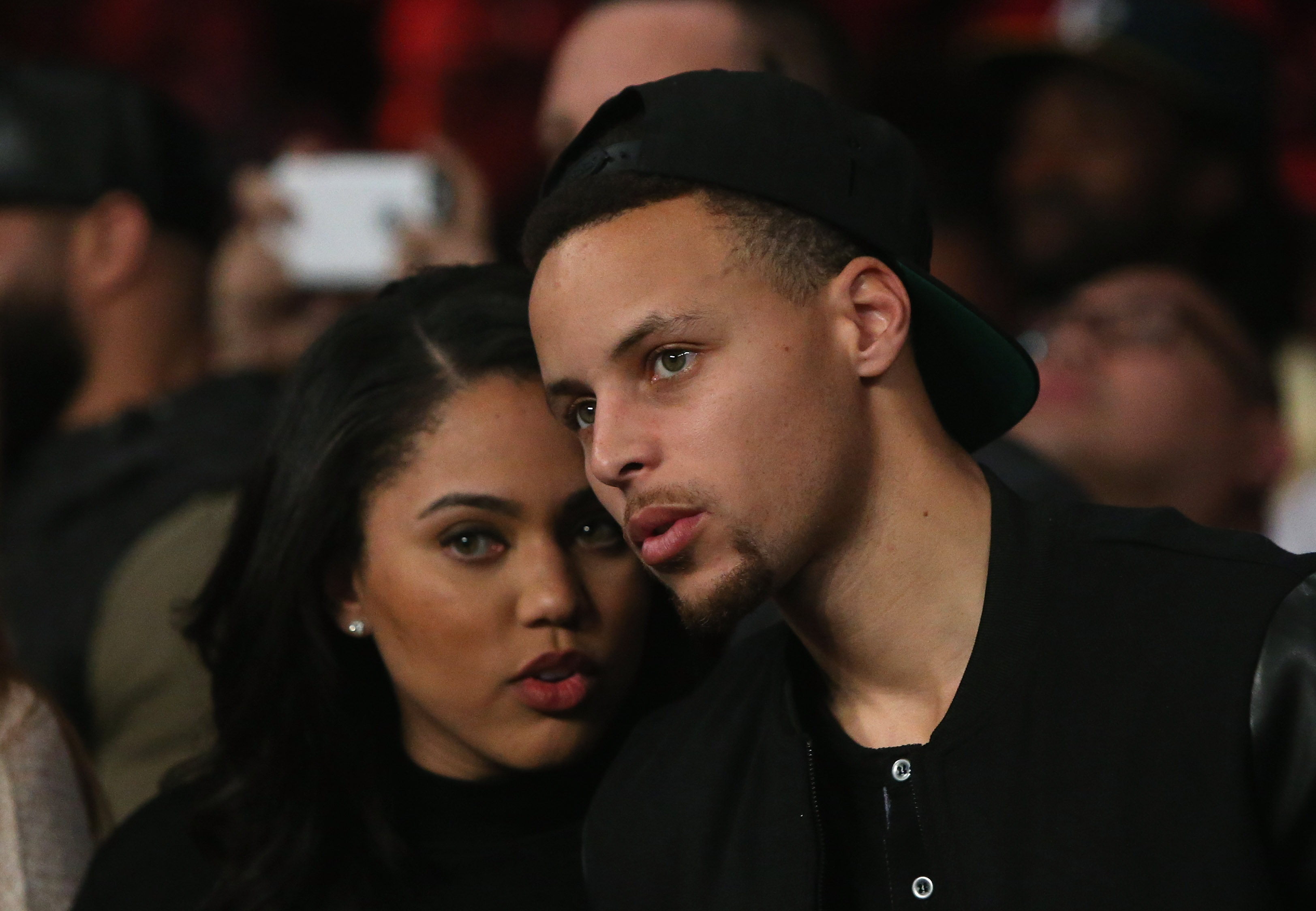 Stephen Curry of the Golden State Warriors and his wife Ayesha attend the Andre Ward fight against Sullivan Barrera in their IBF Light Heavyweight bout at ORACLE Arena on March 26, 2016, in Oakland, Calif. (Ezra Shaw—Getty Images)