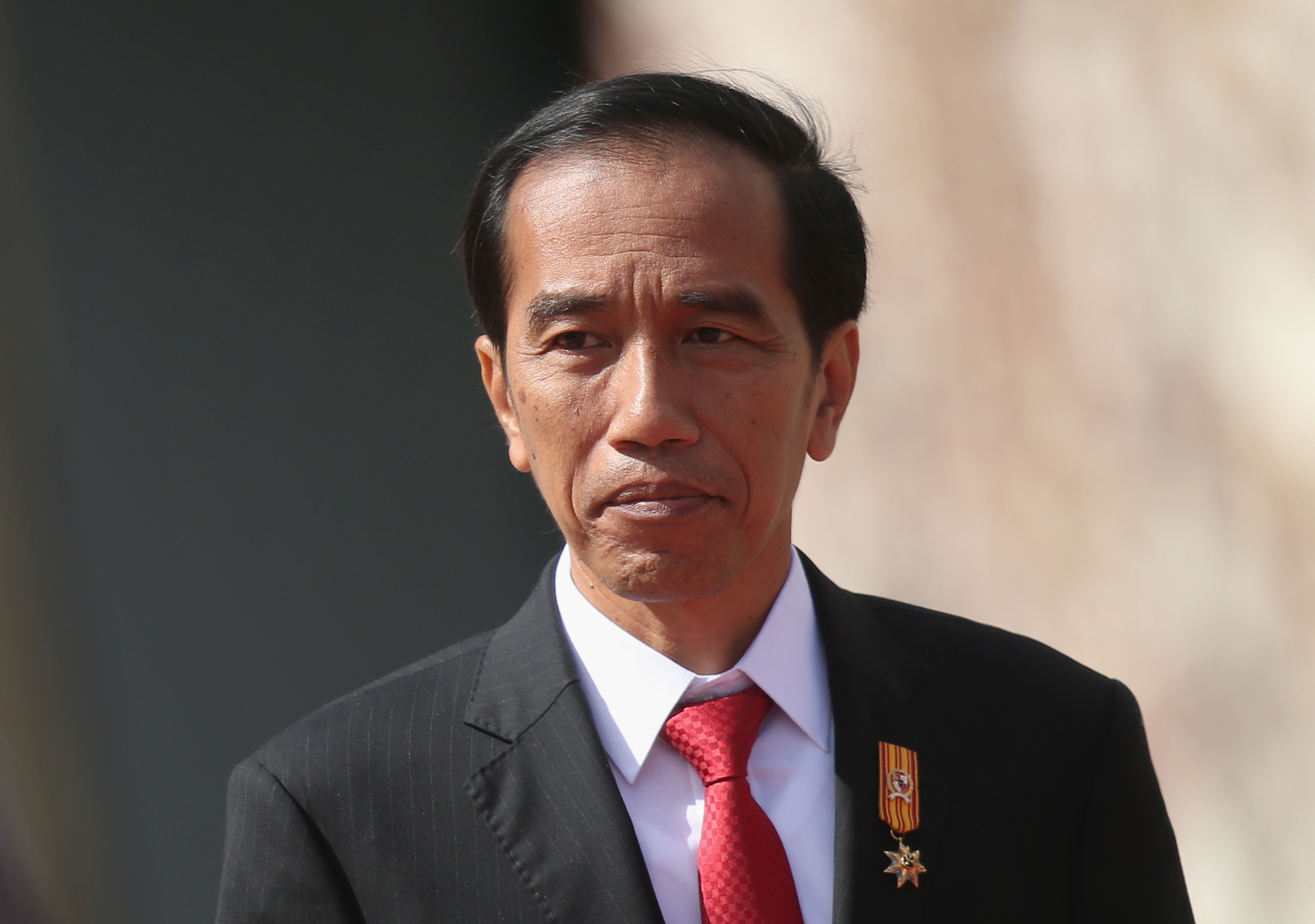 Indonesian President Joko Widodo arrives at the Chancellery in Berlin to meet with German Chancellor Angela Merkel on April 18, 2016 (Sean Gallup—Getty Images)