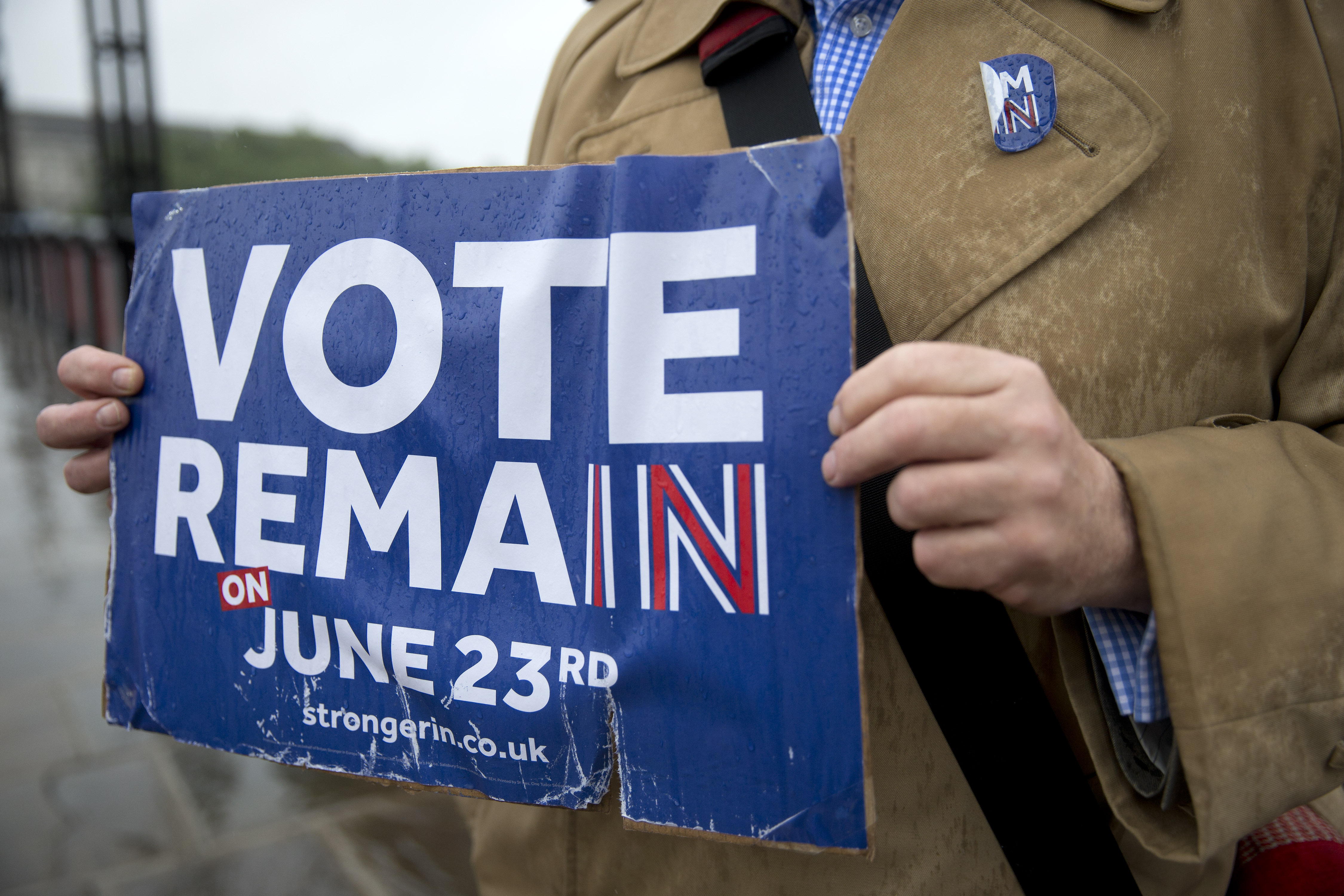 Campaigners hold placards for 'Britain Stronger in Europe', the official 'Remain' campaign group seeking to avoid a Brexit, ahead of the forthcoming EU referendum, in London on June 20, 2016.  JUSTIN TALLIS&mdash;AFP/Getty Images (JUSTIN TALLIS&mdash;AFP/Getty Images)