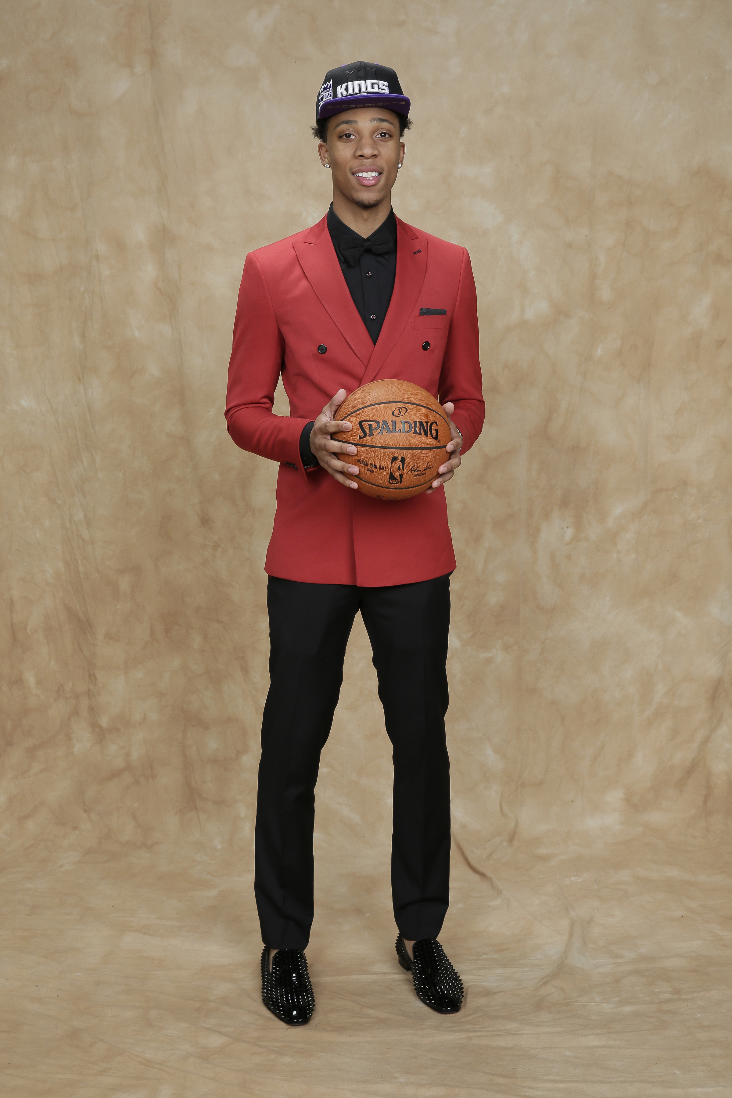 Malachi Richardson wore the undisputed color of the draft night, red, with an edgy twist — a double breasted suit jacket over an all-black ensemble.