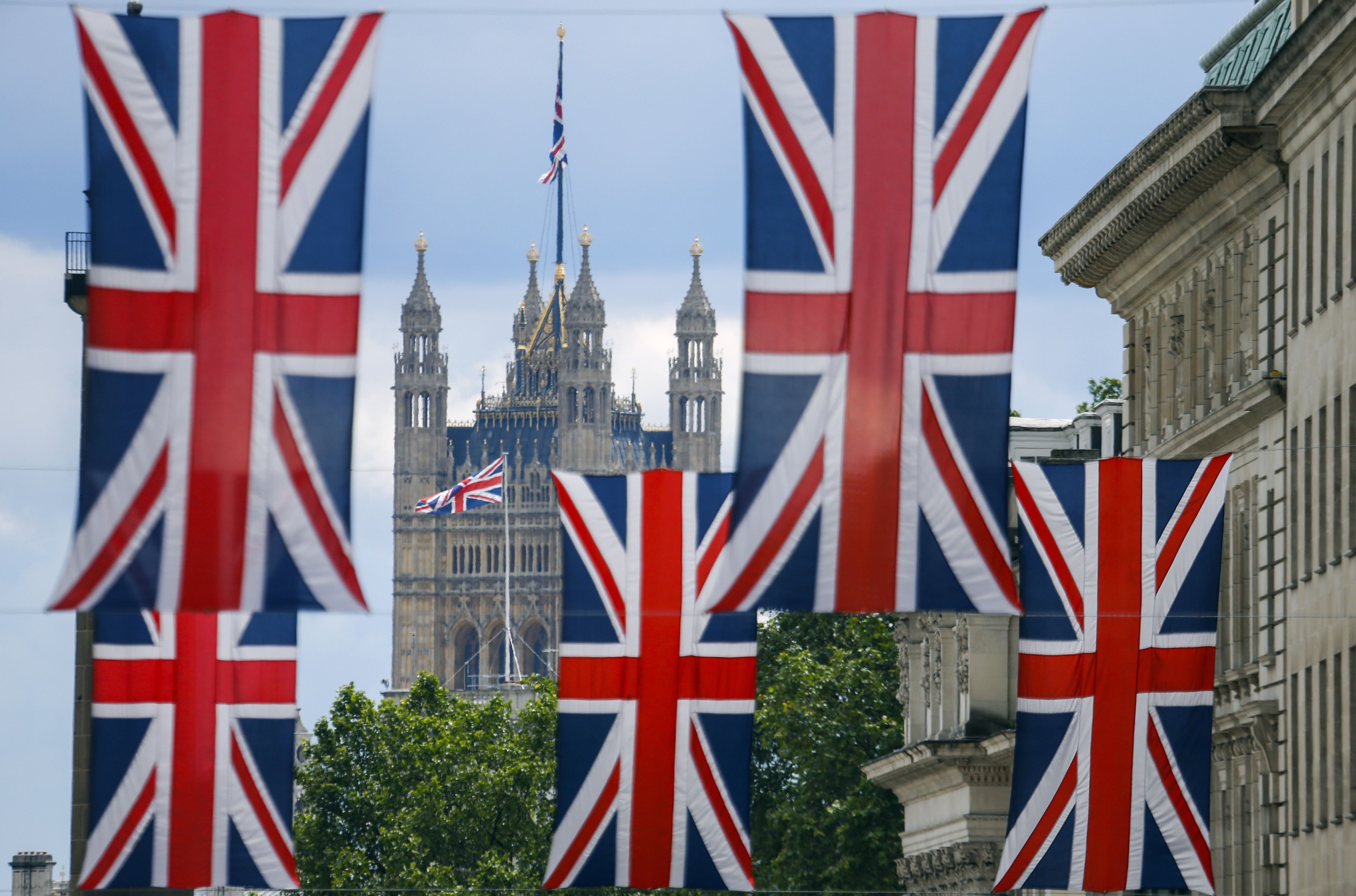 Union flag banners hang across a street near the Houses of Parliament in central London on June 25, 2016 (Odd Andersen—AFP/Getty Images)