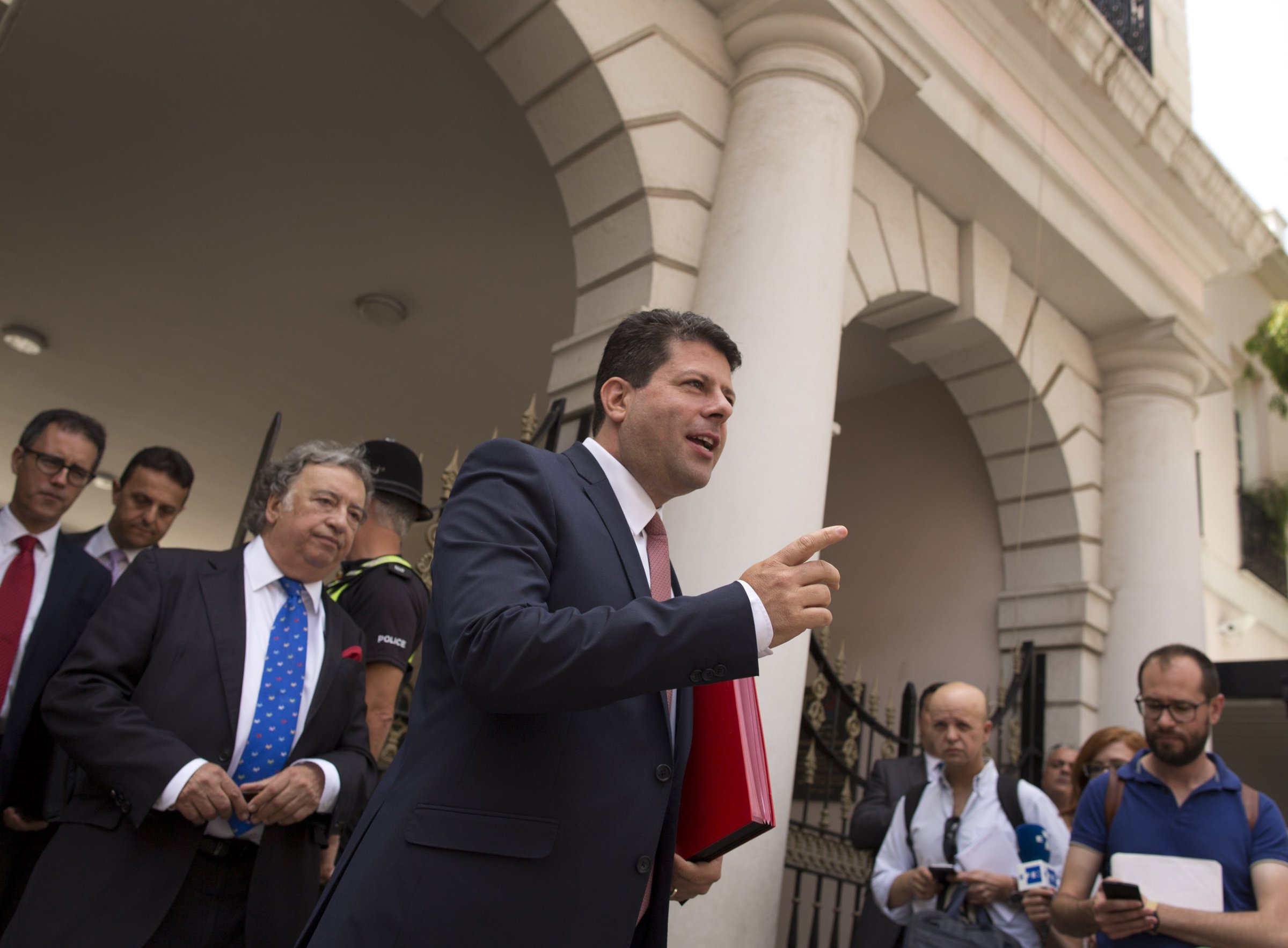 Chief Minister of Gibraltar Fabian Picardo (C) gestures a she leaves after a meeting with members of the Government in Gibraltar on June 24, 2016.
