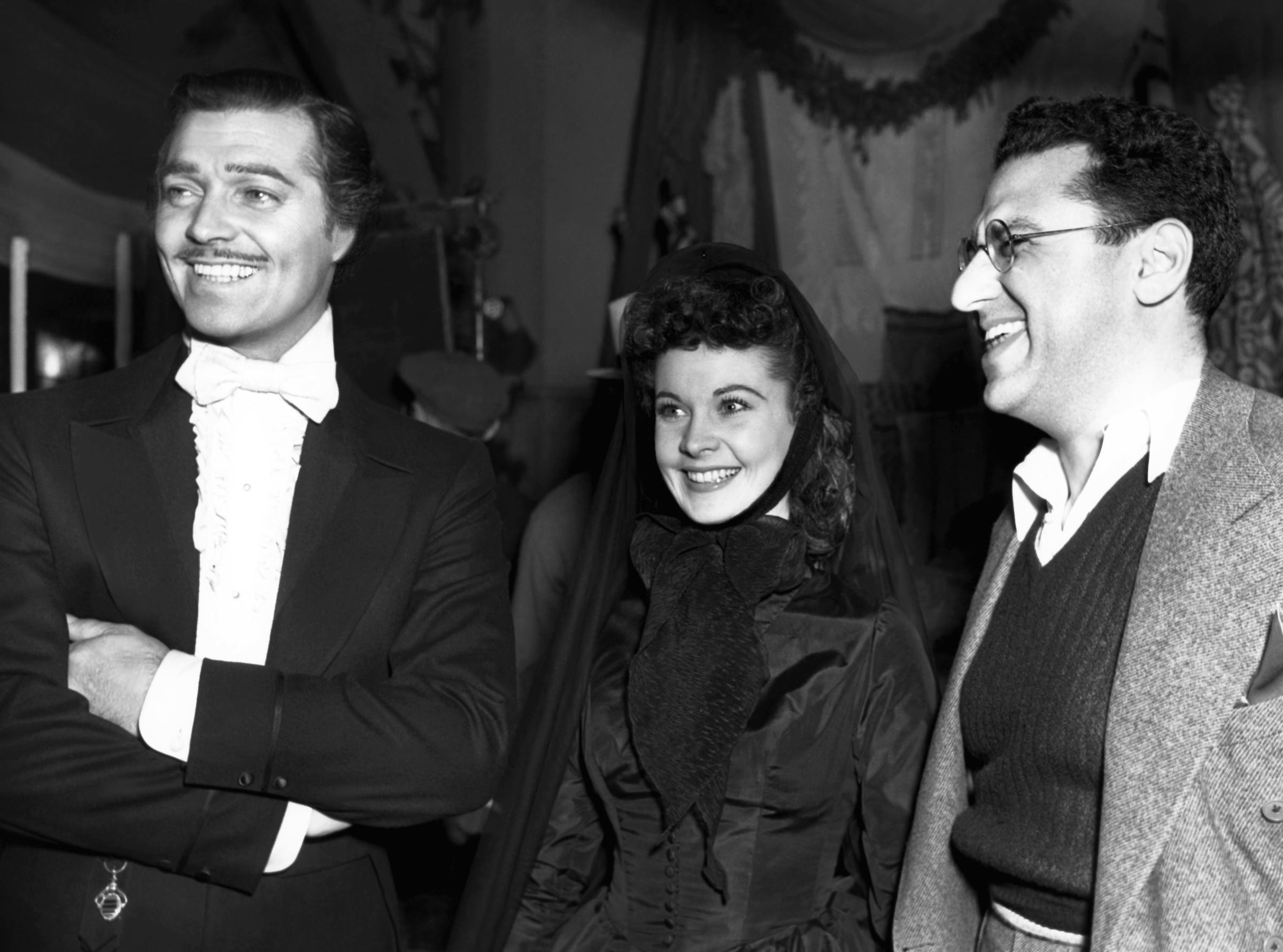 From left: Clark Gable, Vivien Leigh and producer David O. Selznick on the set of Gone with the Wind in 1939.