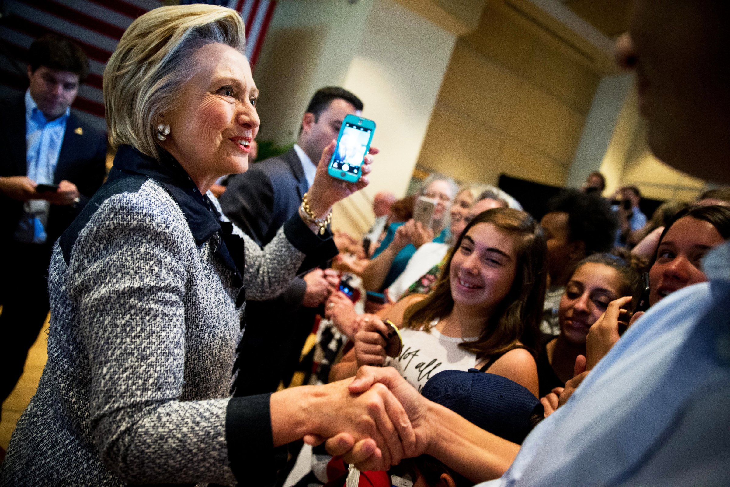 Hillary Clinton greets members of the audience after speaking at a rally at the International Brotherhood of Electrical Workers Circuit Center in Pittsburgh on June 14, 2016.
