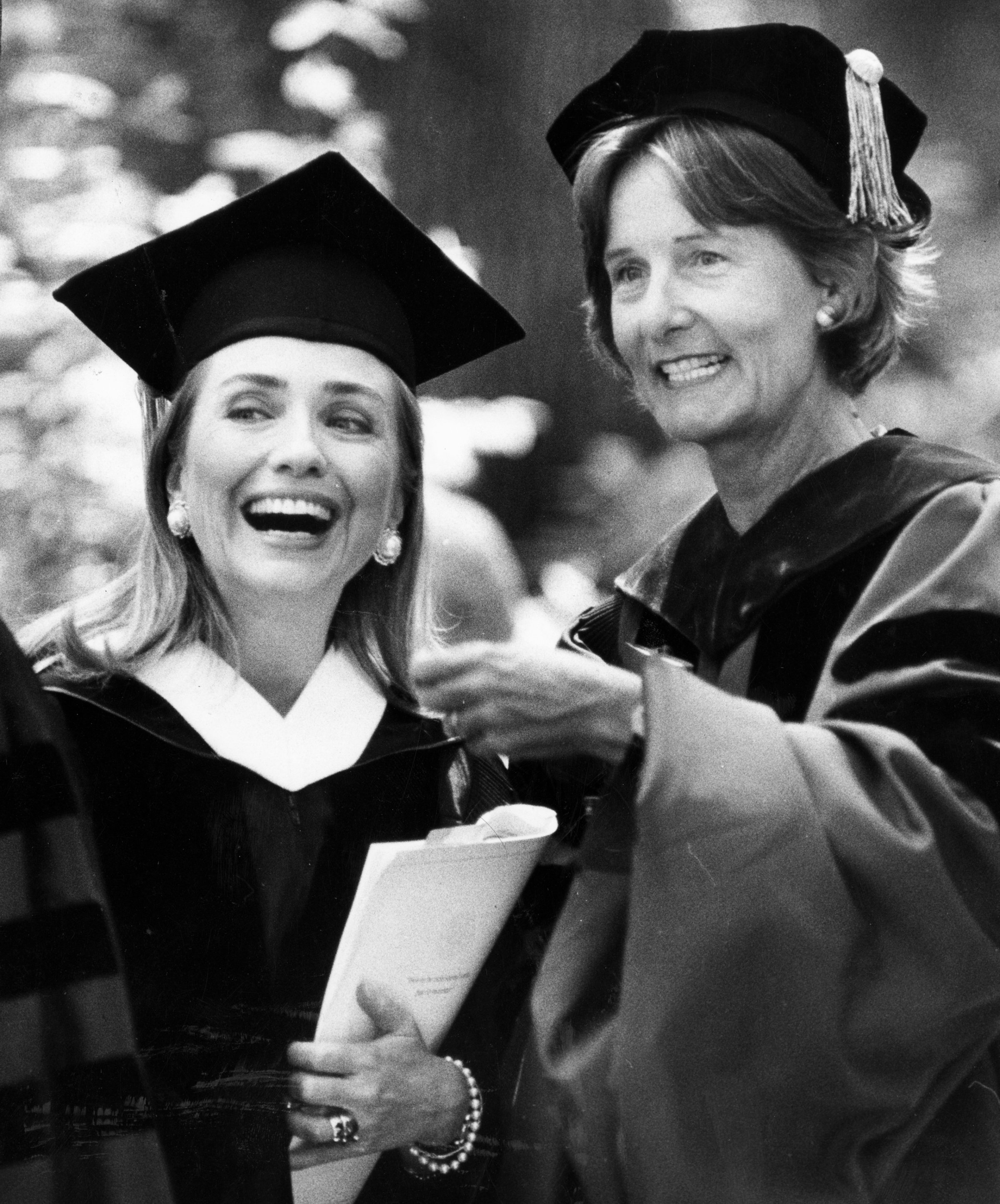 Hillary Clinton, right, and Wellesley College's president, Nannerl O. Keohane, share a light moment at commencement in Wellesley, Mass., on May 29, 1992.