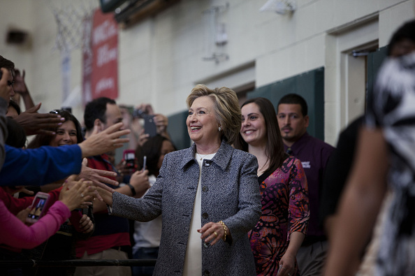 Hillary Clinton, former Secretary of State and 2016 Democratic presidential candidate, center, greets attendees while arriving for a campaign event in Hartford, Connecticut, U.S., on Thursday, April 21, 2016.