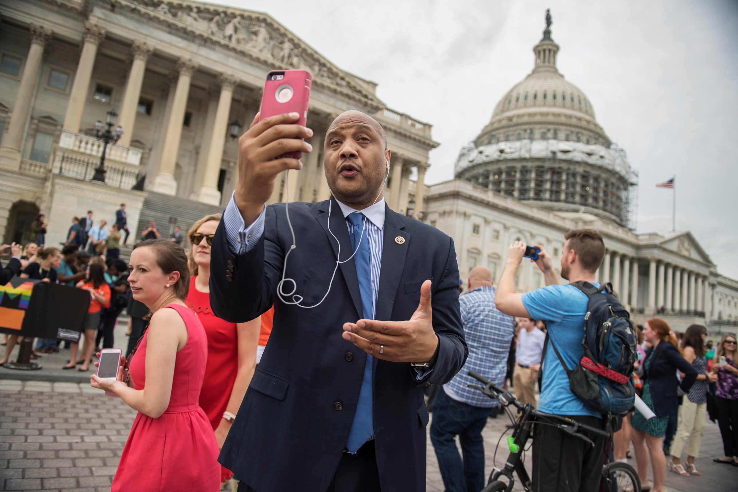 Rep. Andre Carson, D-Ind., concurs an interview via FaceTime on the East Front of the Capitol after the House Democrats' sit-in ended on the floor, June 23, 2016.
