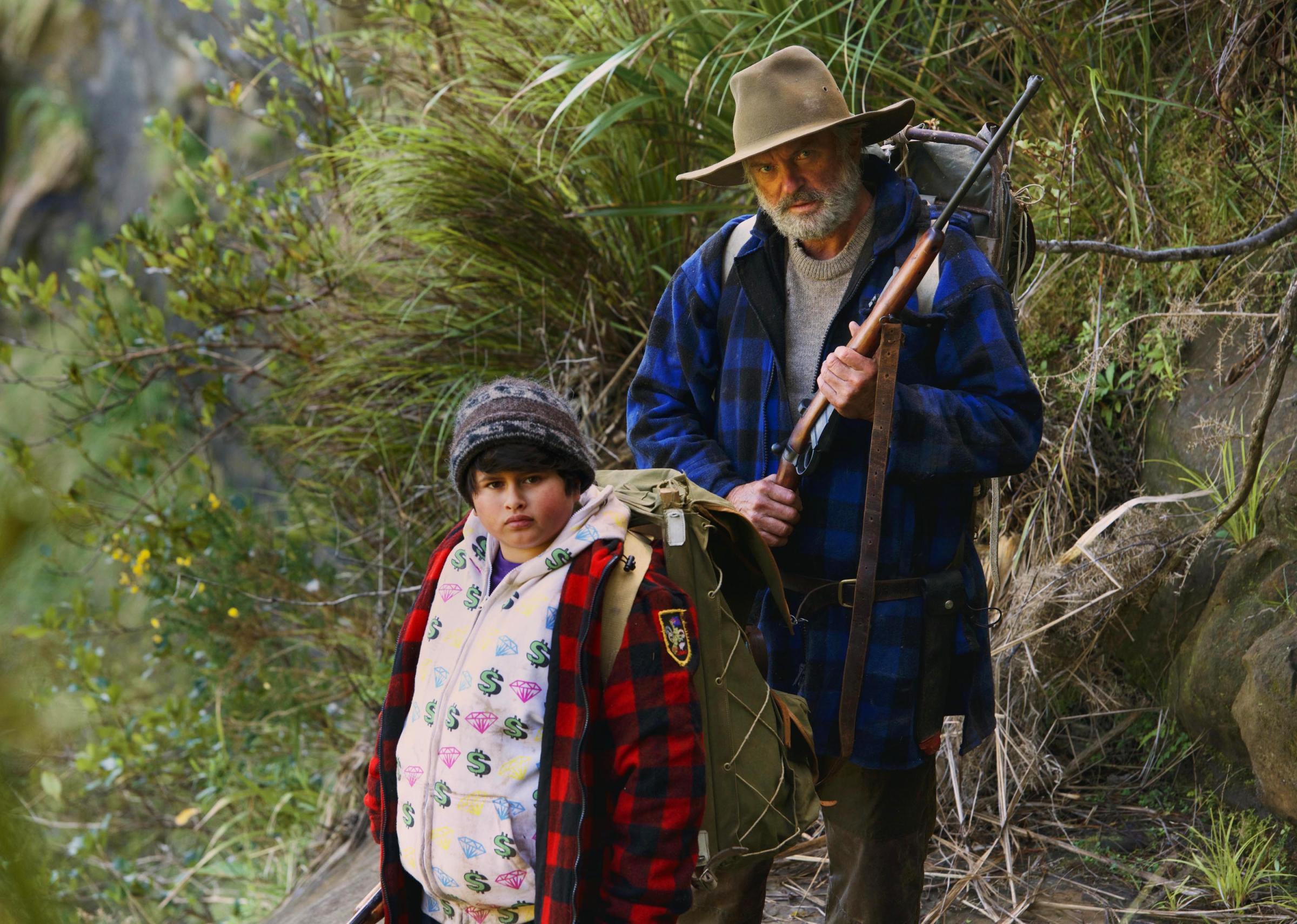 Julian Dennison, left, and Sam Neill, right, in "Hunt For The Wilderpeople.